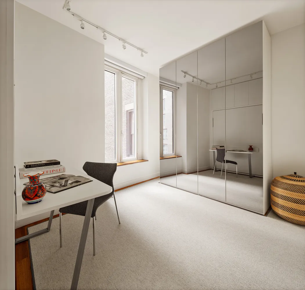 a bathroom with a sink a toilet and bathtub