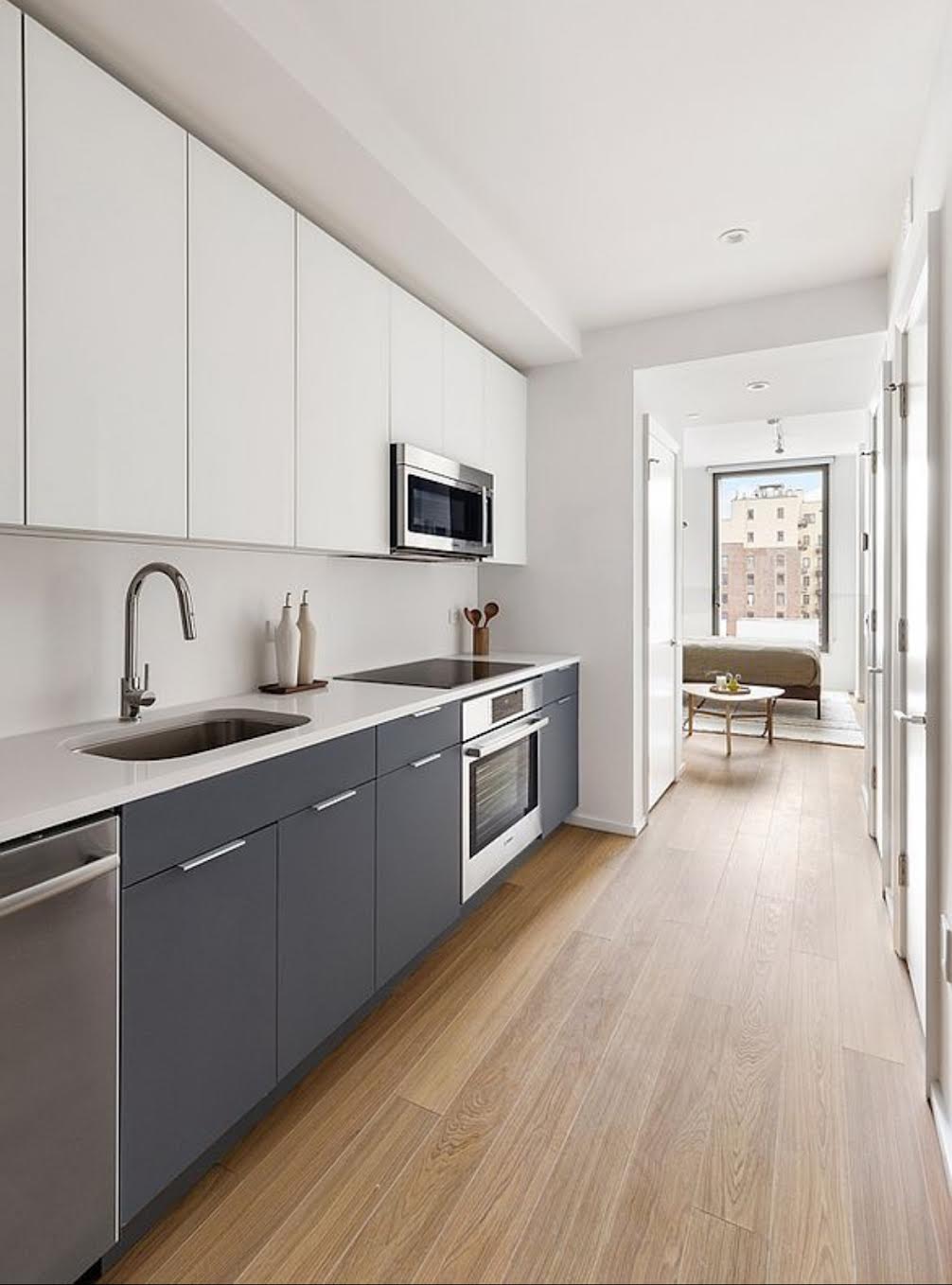 5 South 5th Street, Unit 308 Brooklyn, NY 11249 - Photo 2 of 13 a kitchen with sink a stove and cabinets