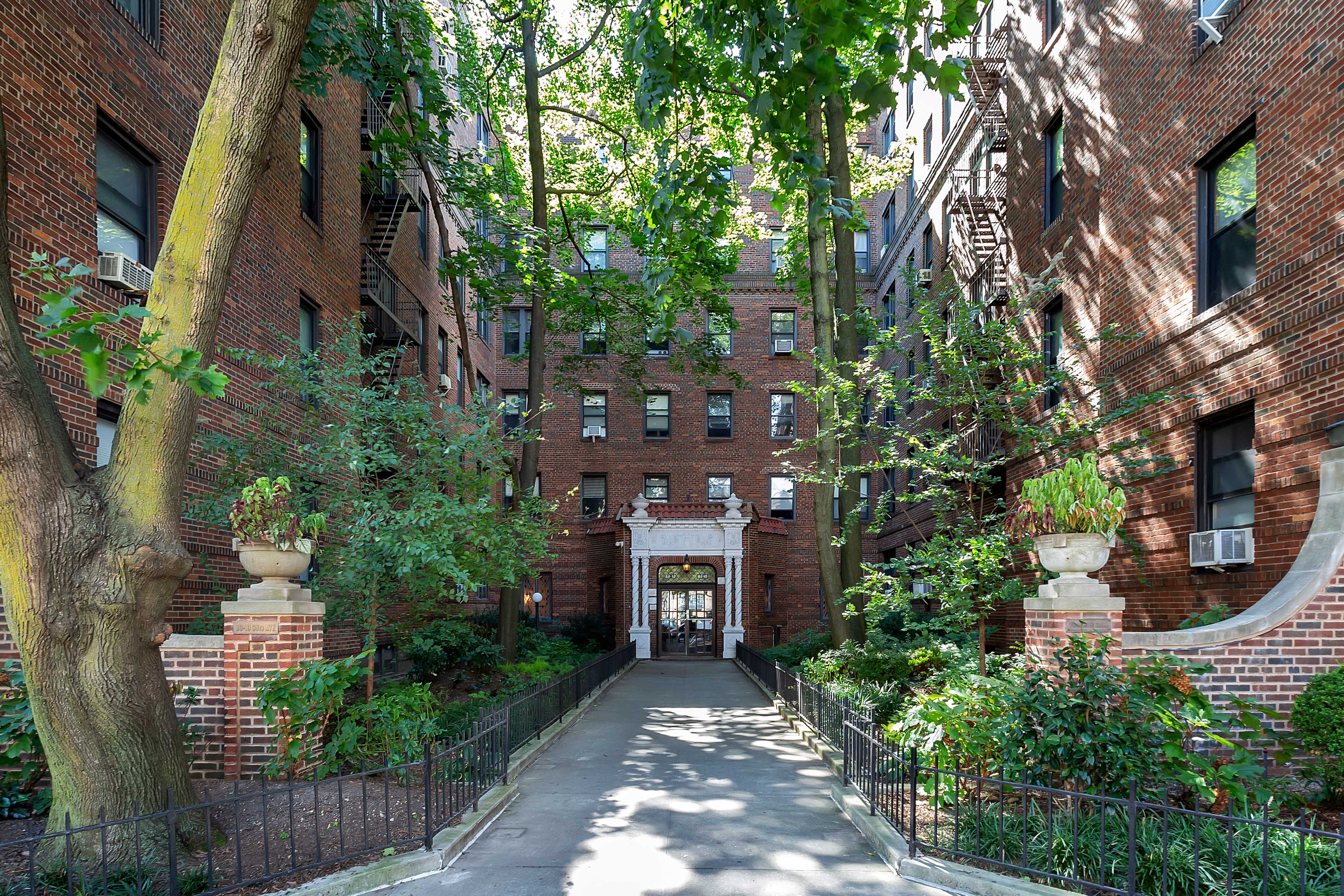 83-10 35th Avenue, Unit 6C Queens, NY 11372 - Photo 12 of 13 an aerial view of a house