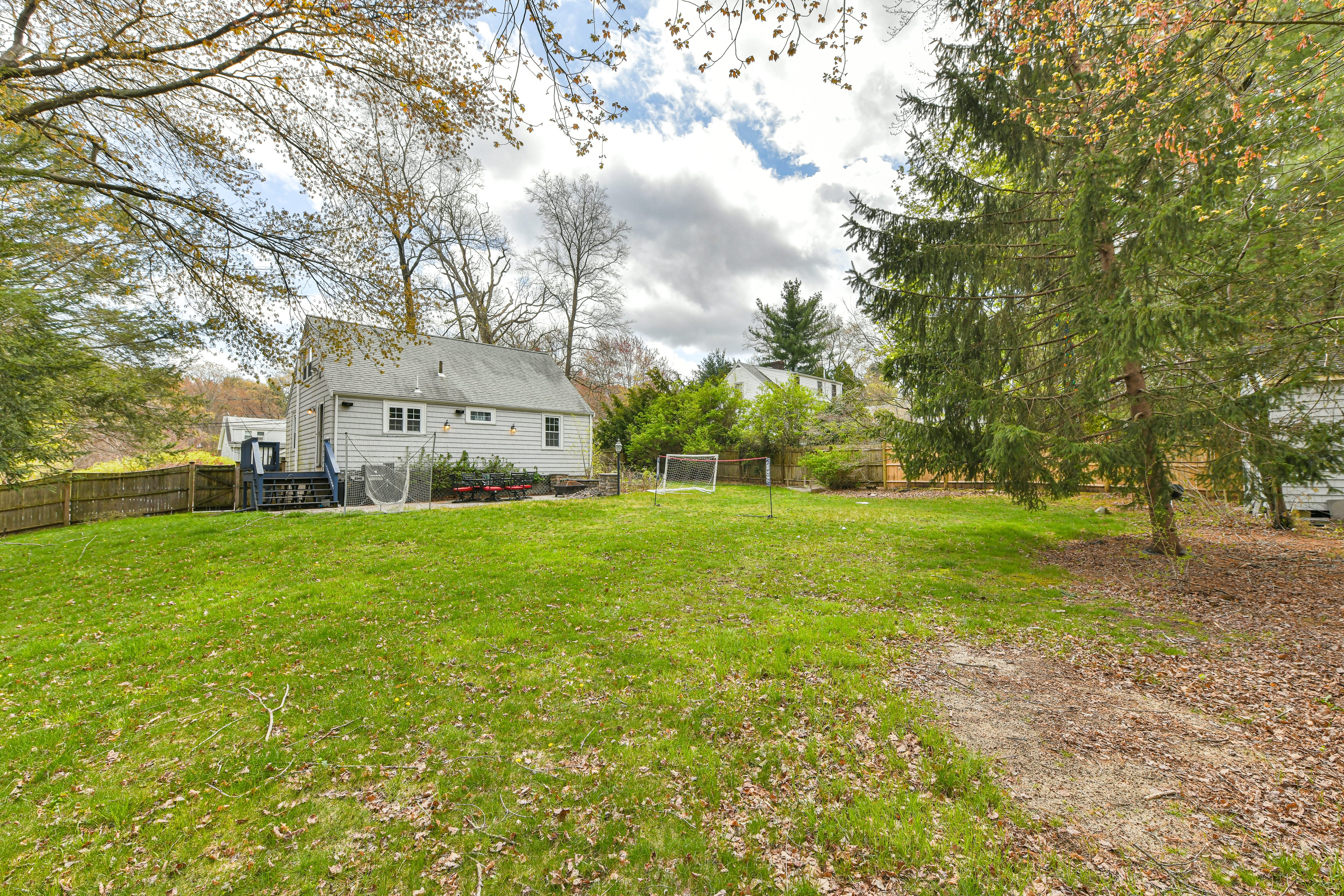 50 Rustic Road Walpole, MA 02032 - Photo 14 of 16 a view of a park with large trees