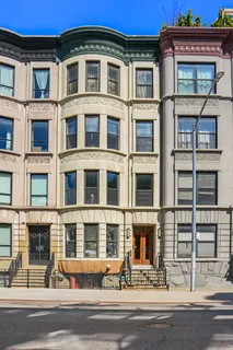 a view of a building with a street