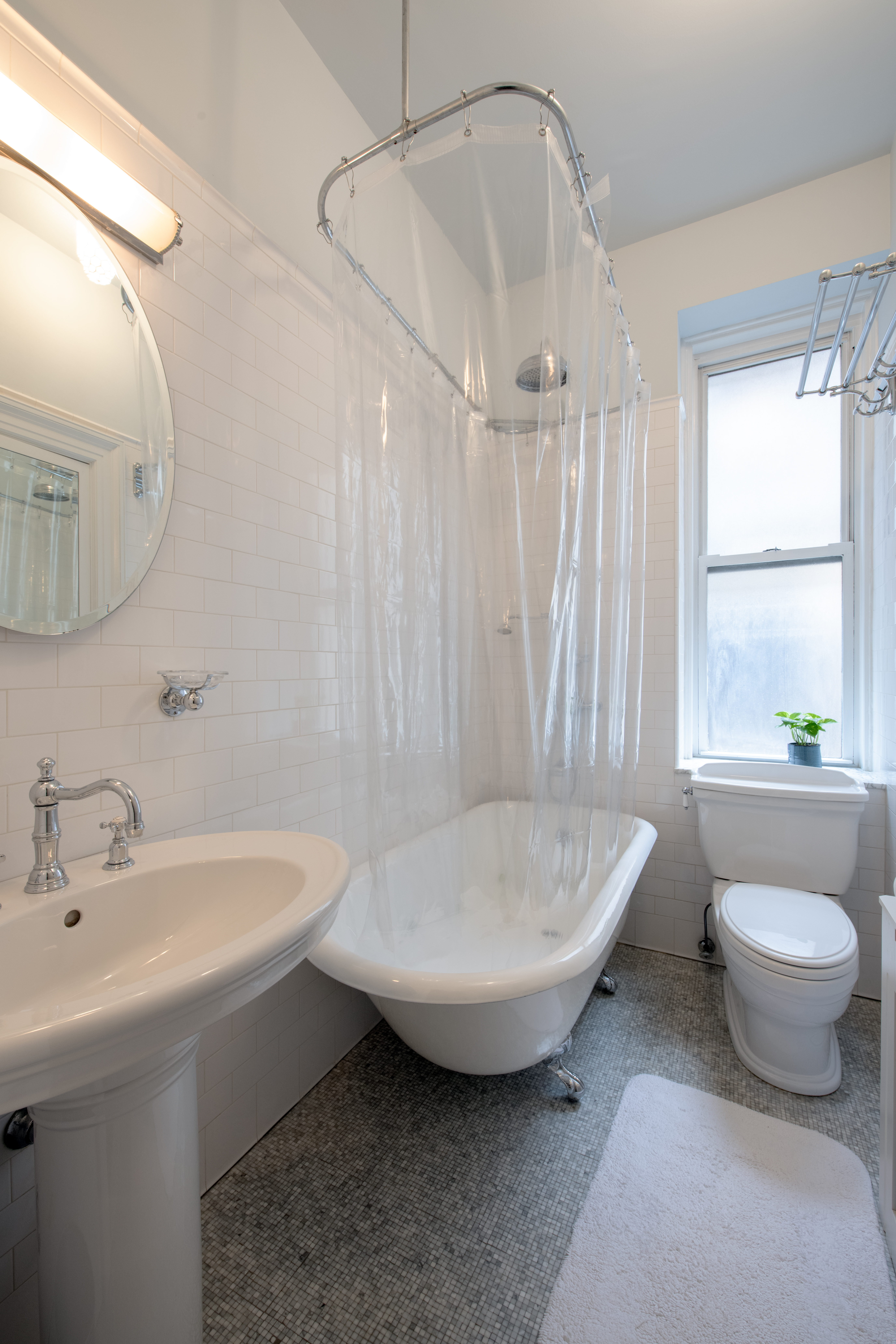 194 Riverside Drive, Unit 5C/6C Manhattan, NY 10025 - Photo 6 of 26 a bathroom with a sink toilet and shower