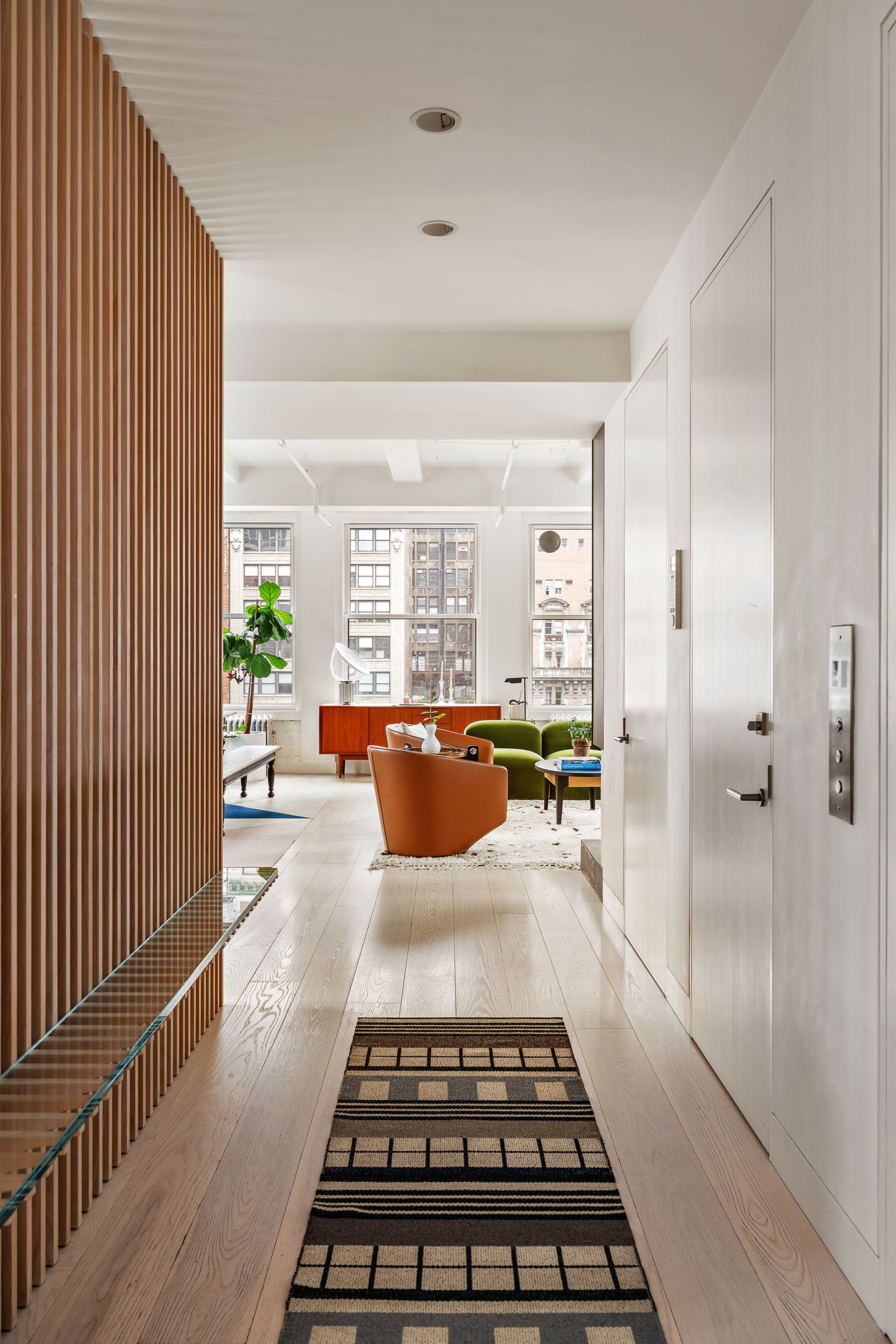 24 West 30th Street, Unit 7 Manhattan, NY 10001 - Photo 6 of 13 a large white kitchen with a large window