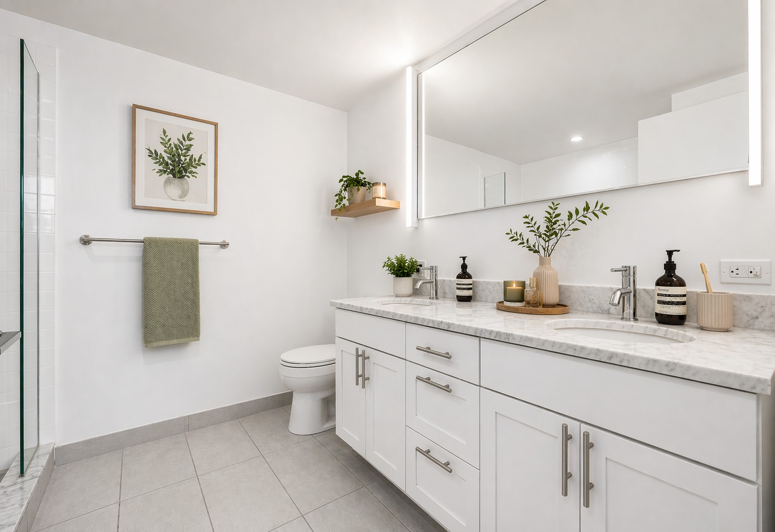 424 Bedford Avenue, Unit 8B Brooklyn, NY 11249 - Photo 13 of 21 a bathroom with a toilet sink and mirror