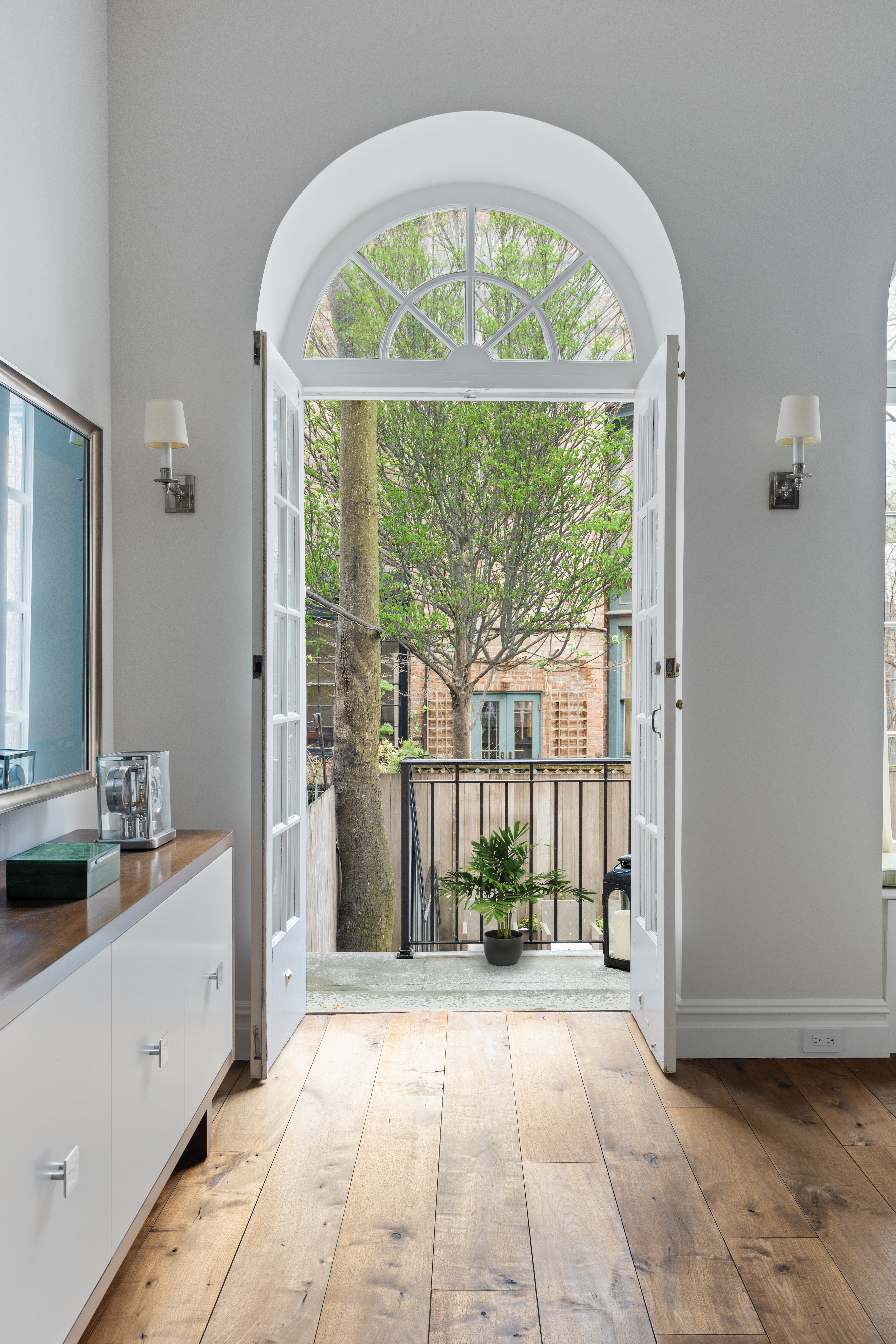 14 West 11th Street, Unit GARDEN Manhattan, NY 10011 - Photo 5 of 18 a view of a room with a porch and garden