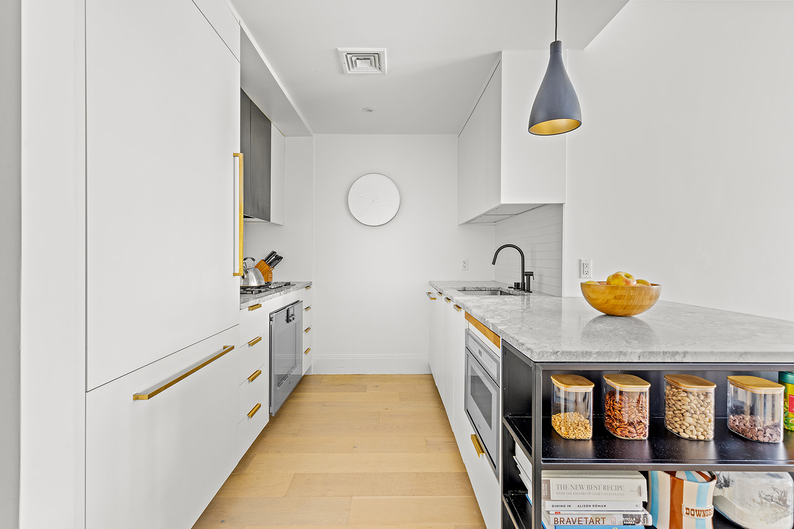 610 Warren Street, Unit GDNB Brooklyn, NY 11217 - Photo 3 of 17 a kitchen with wooden cabinets and sink
