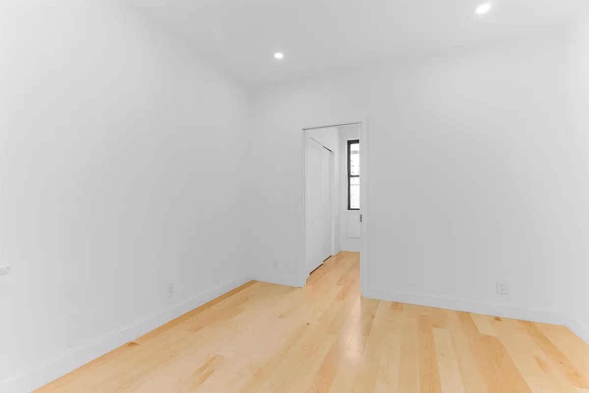 324 East 84th Street, Unit 1D Manhattan, NY 10028 - Photo 3 of 6 a view of a big room with closet