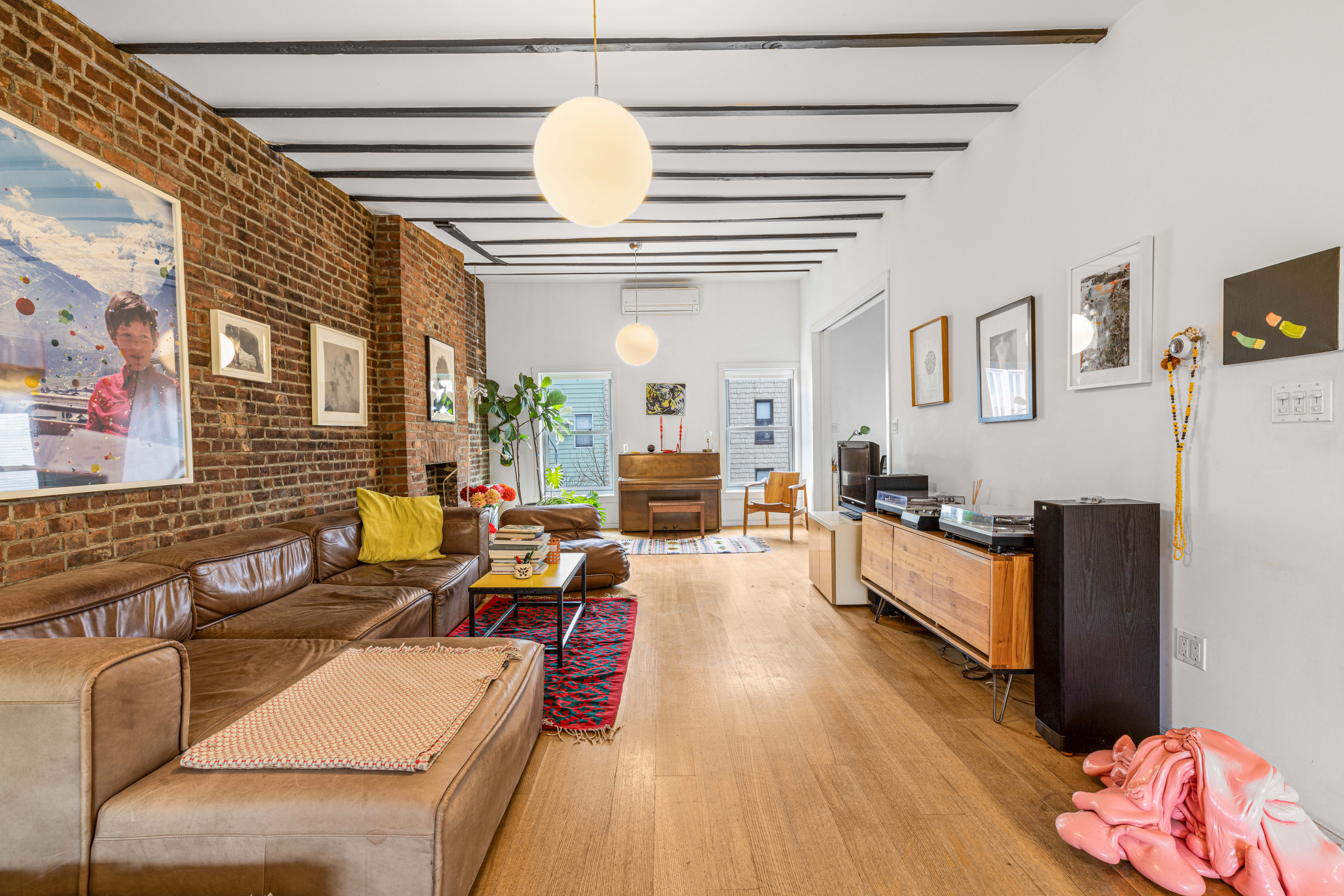 209 Calyer Street, Unit 2 Brooklyn, NY 11222 - Photo 3 of 17 a living room with furniture
