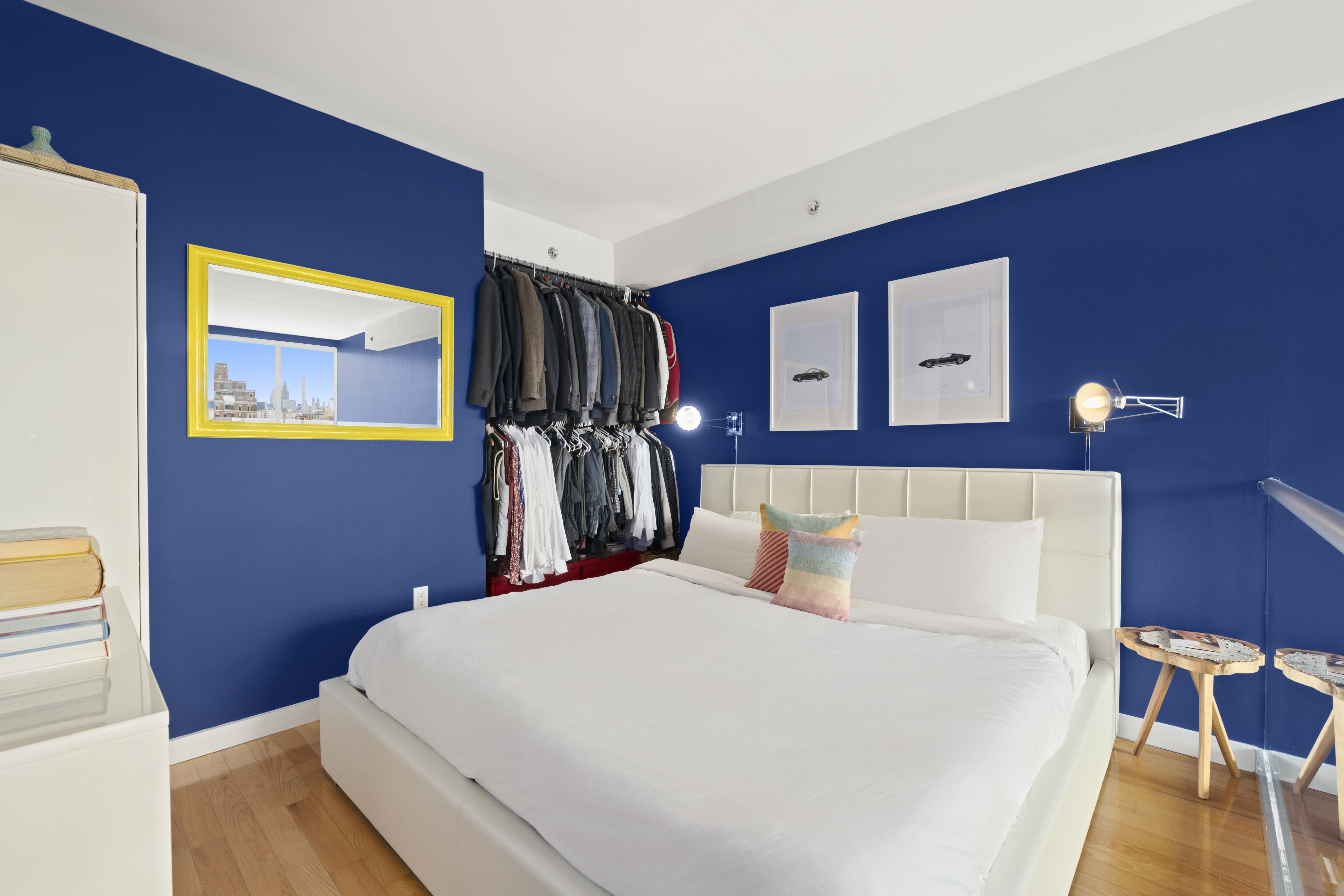 362 West 127th Street, Unit PHA Manhattan, NY 10027 - Photo 4 of 7 a bedroom with a bed and a painting on the wall