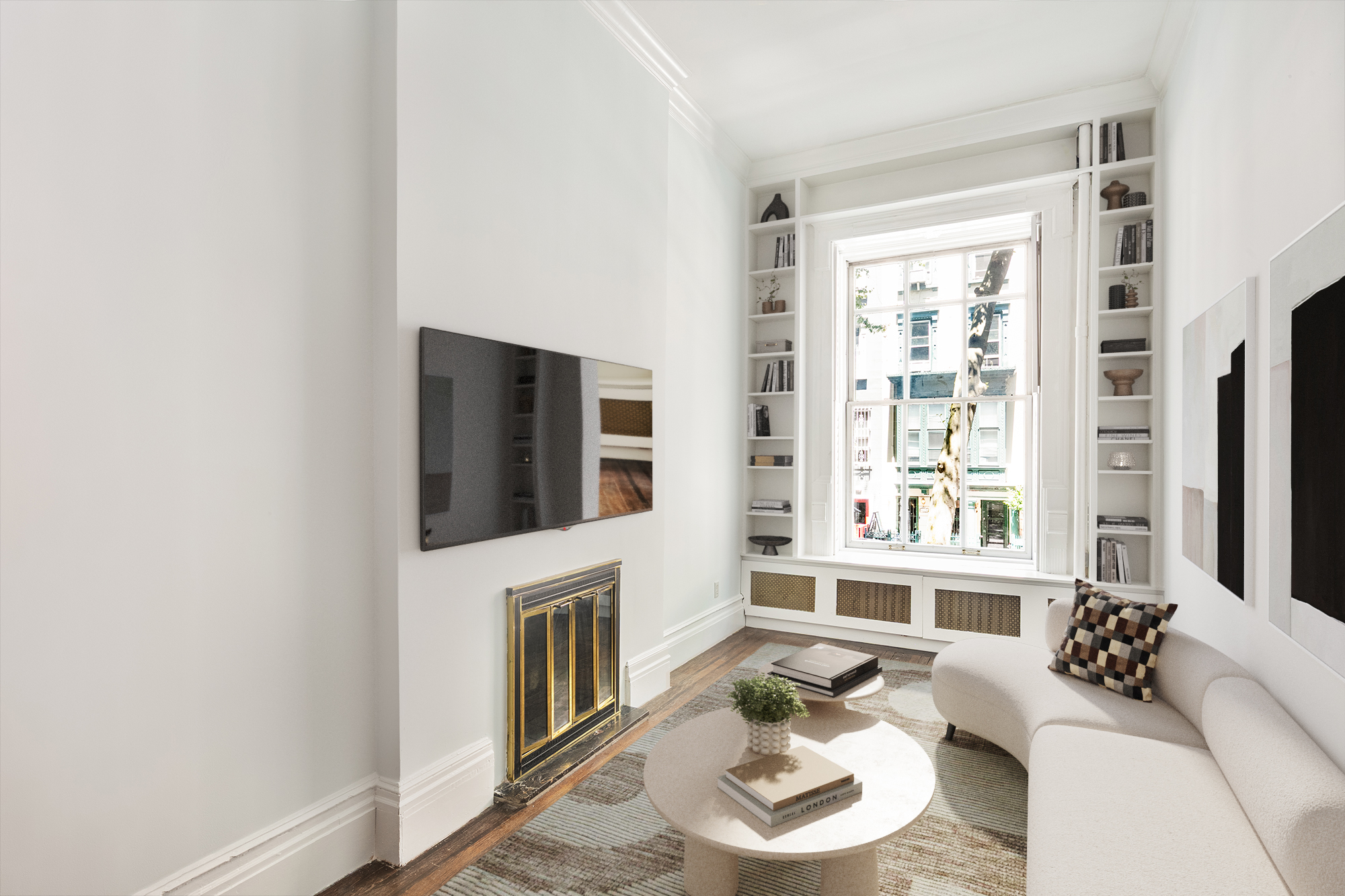 112 West 78th Street, Unit PARLOR Manhattan, NY 10024 - Photo 7 of 37 a living room with furniture a fireplace and a flat screen tv