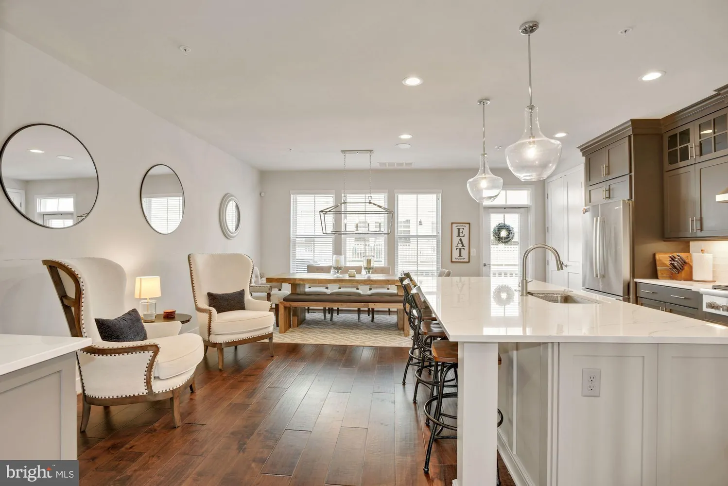 a view of a kitchen and dining room