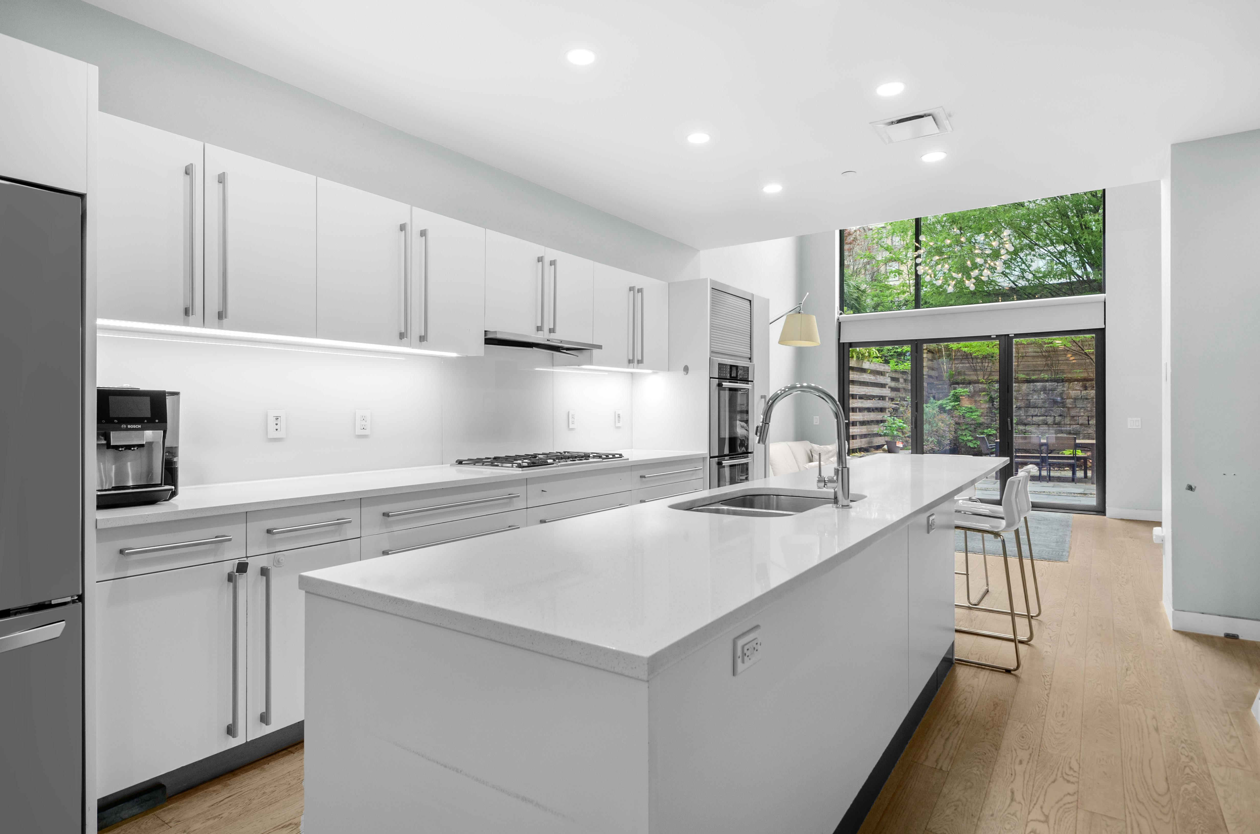 301 State Street Brooklyn, NY 11201 - Photo 3 of 14 a kitchen with a sink stove and cabinets