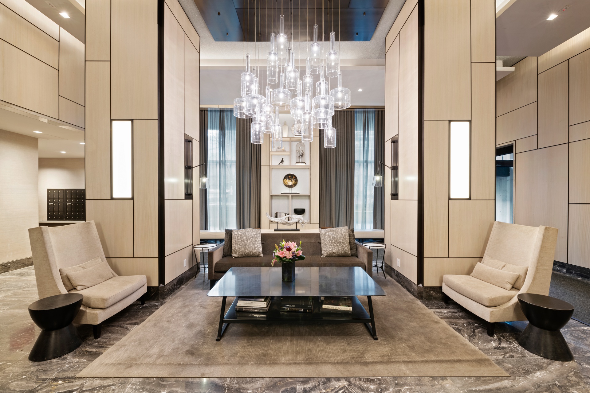 300 East 59th Street, Unit 2103 Manhattan, NY 10022 - Photo 12 of 14 a living room with furniture and a chandelier