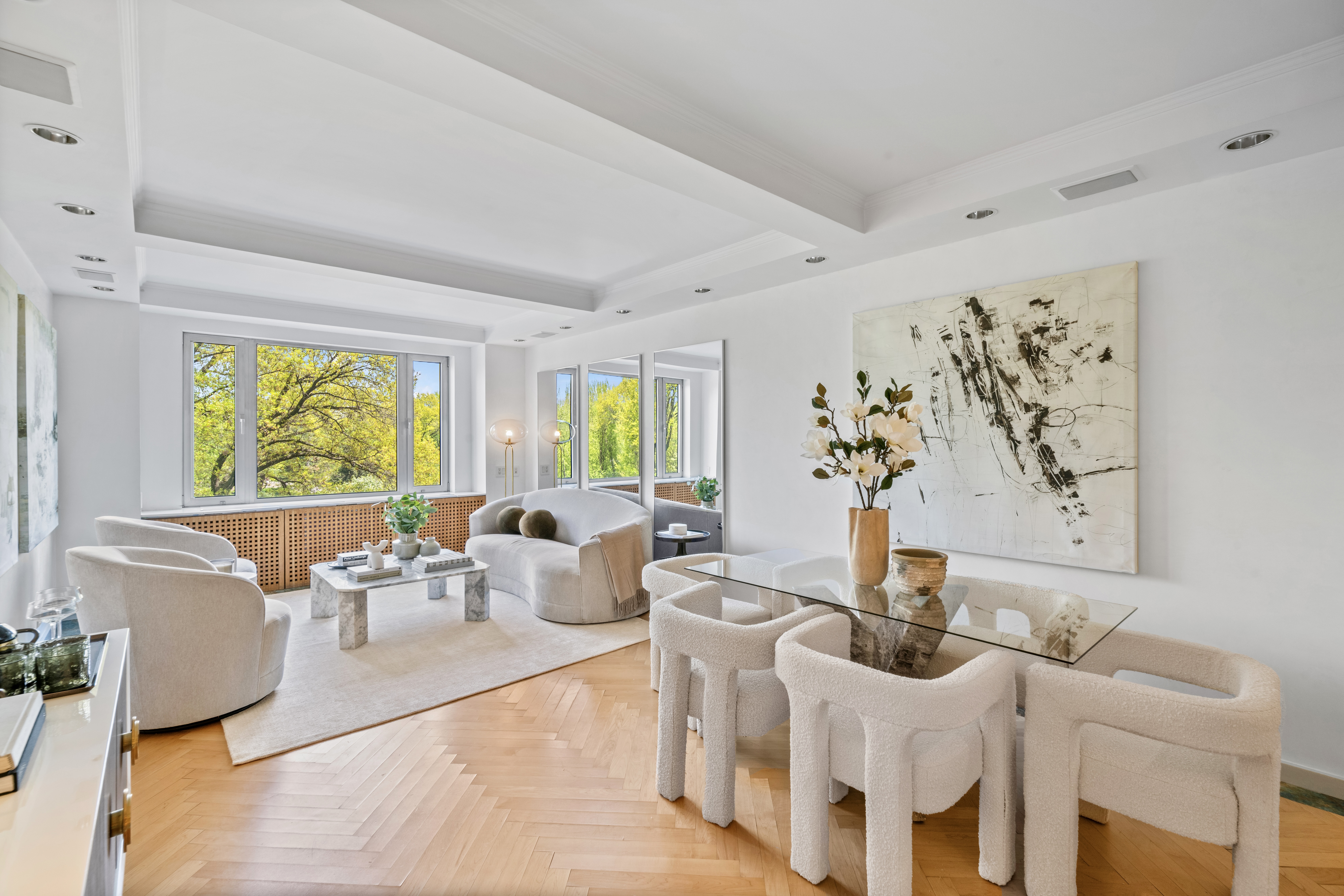 120 Central Park South, Unit 6AB Manhattan, NY 10019 - Photo 5 of 17 a living room with furniture and a large window