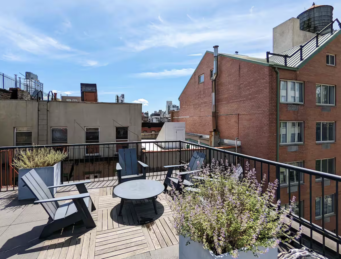 240 Mulberry Street, Unit 2 Manhattan, NY 10012 - Photo 18 of 19 a terrace of a house with outdoor seating