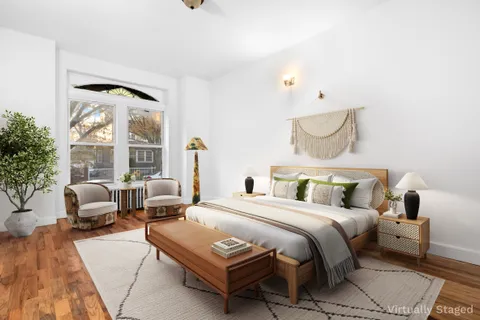 a view of a kitchen with microwave and cabinets