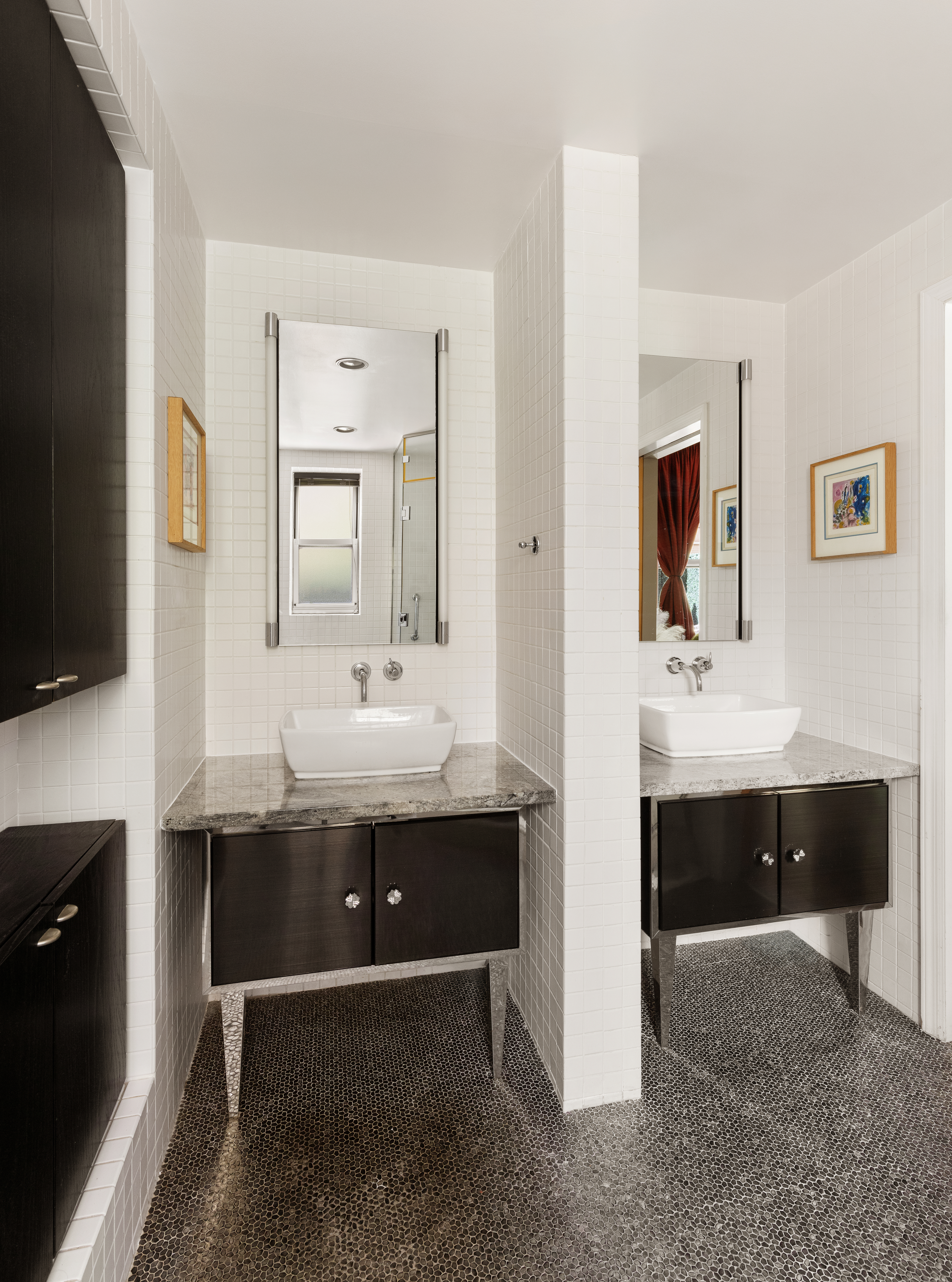 11 5th Avenue, Unit 2D Manhattan, NY 10003 - Photo 8 of 11 a bathroom with a sink double vanity and mirror