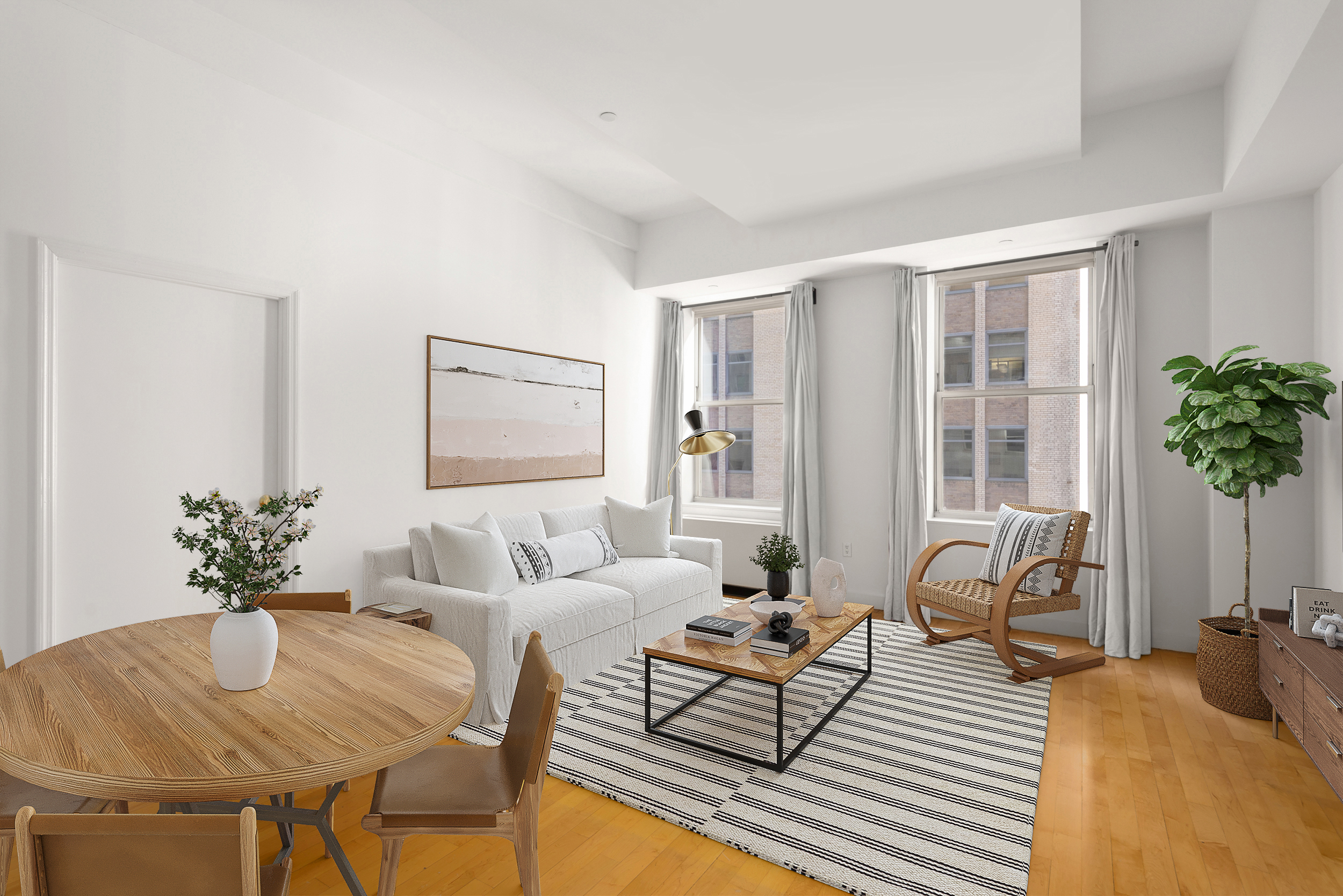 15 Broad Street, Unit 1100 Manhattan, NY 10005 - Photo 1 of 23 a living room with furniture potted plant and a window