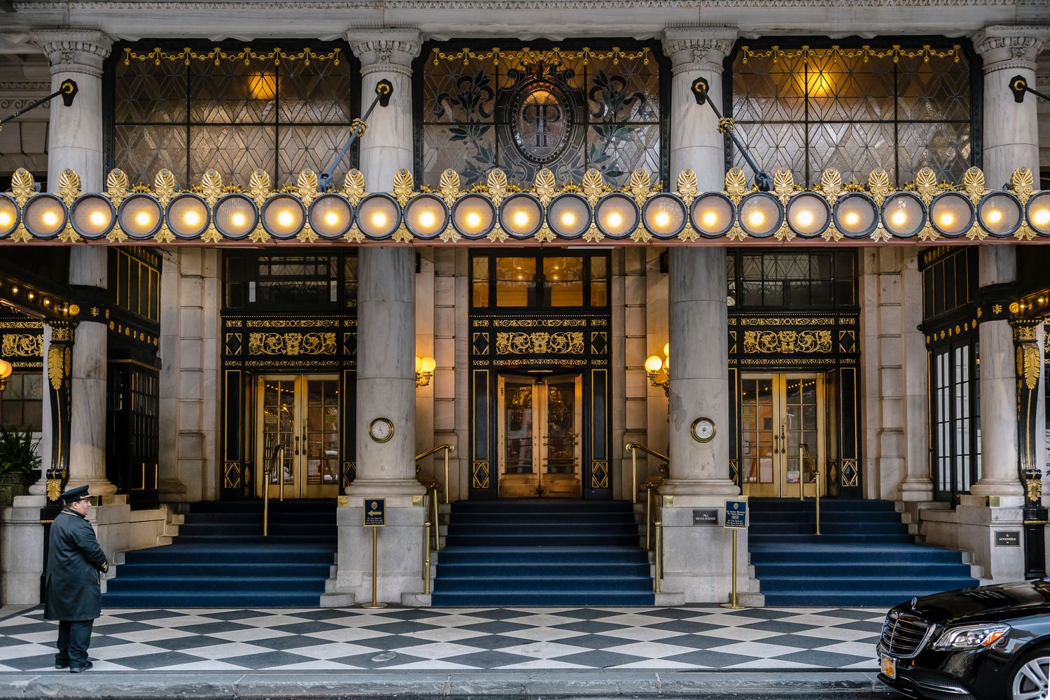 1 Central Park South, Unit 1502 Manhattan, NY 10019 - Photo 17 of 19 a front view of a building with lots of green space