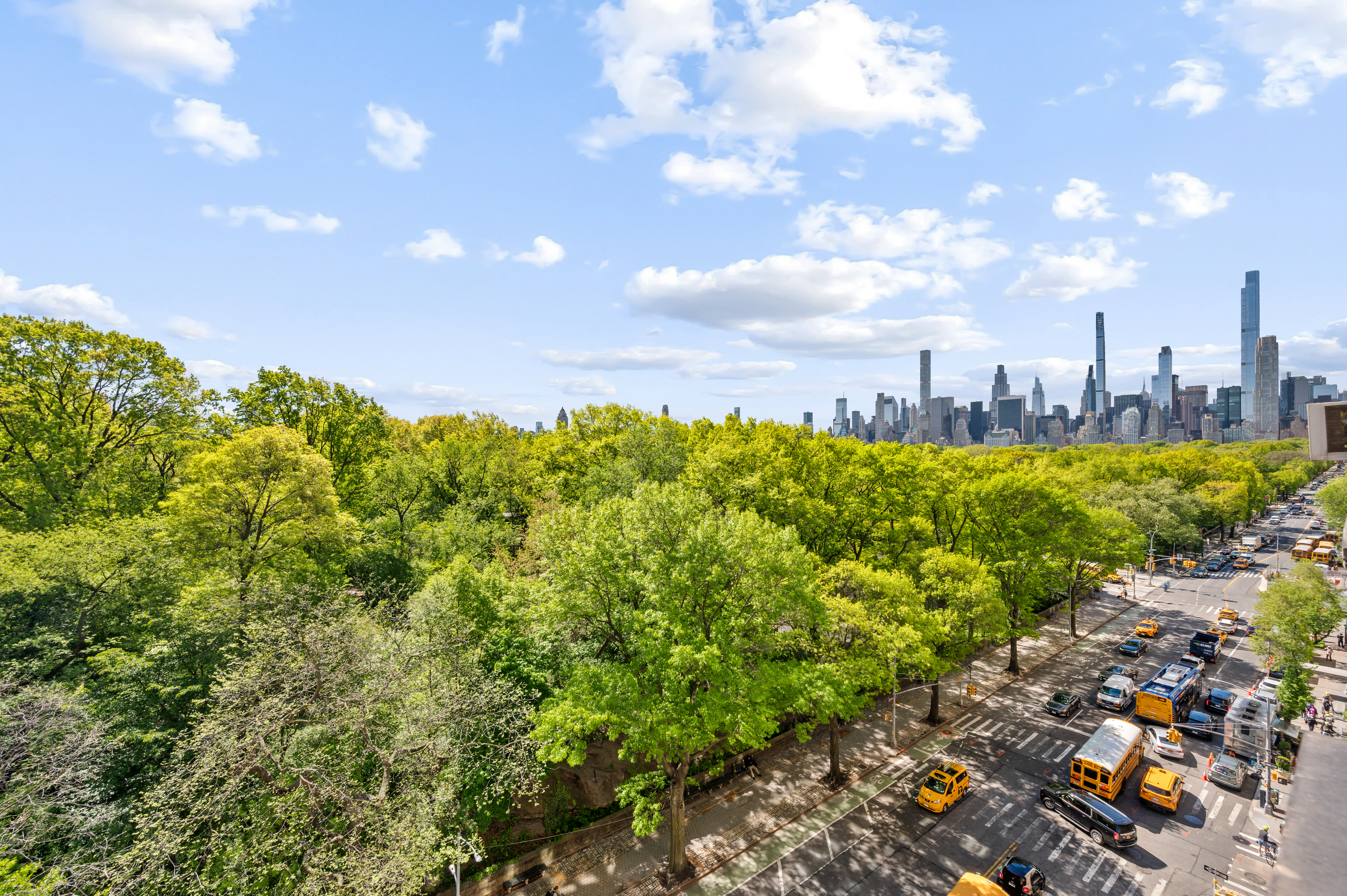225 Central Park West, Unit 905/906 Manhattan, NY 10024 - Photo 2 of 12 a view of a city with lush green forest