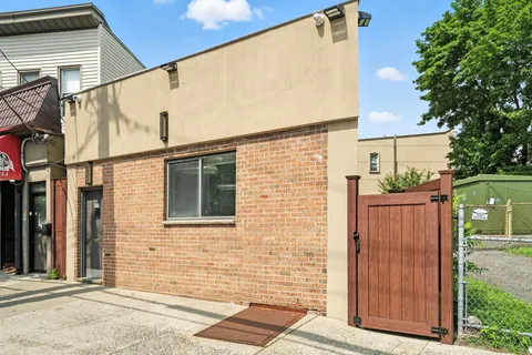 a backyard of a house with seating space