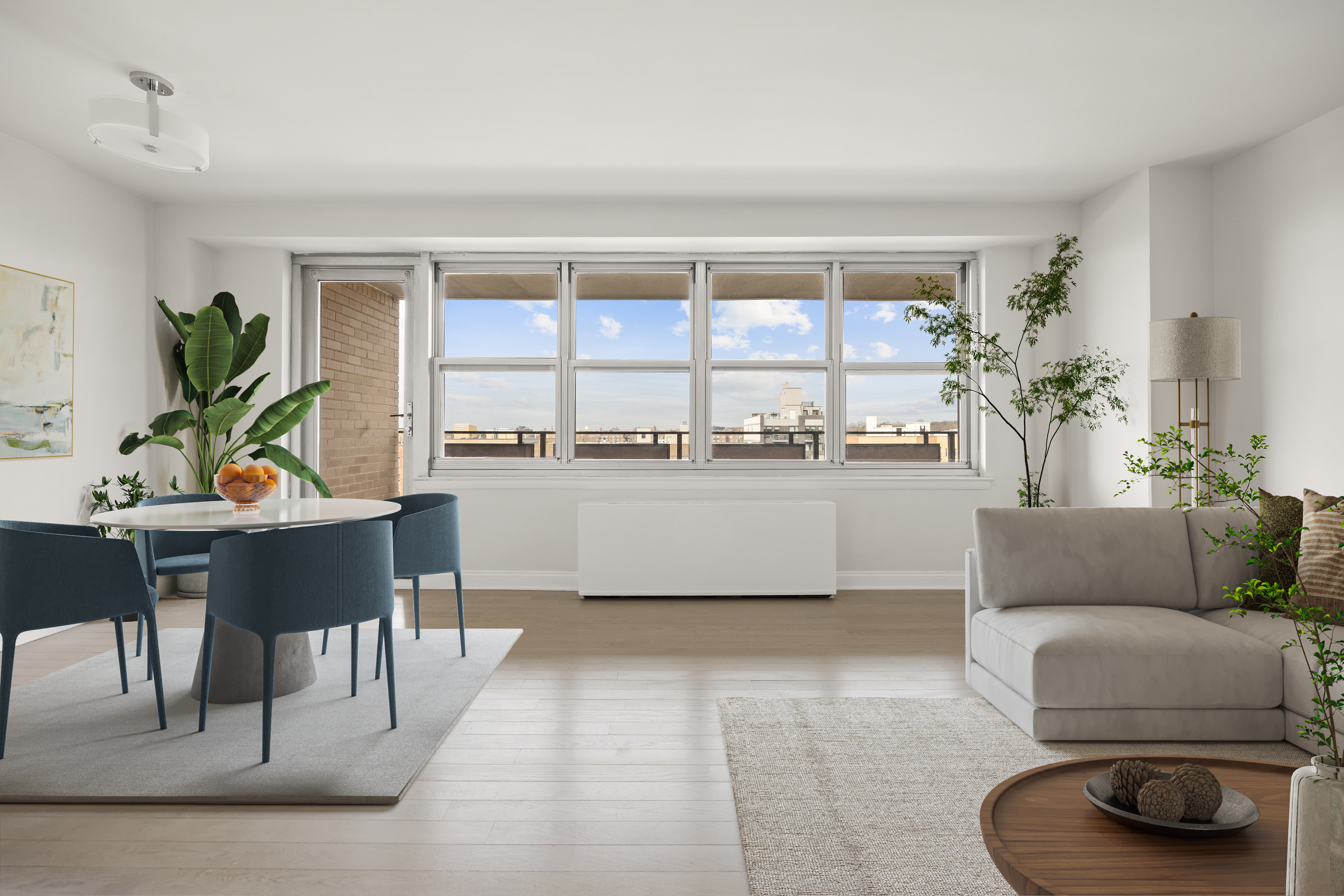 135 Ocean Parkway, Unit 9M Brooklyn, NY 11218 - Photo 2 of 18 a living room with furniture and a potted plant