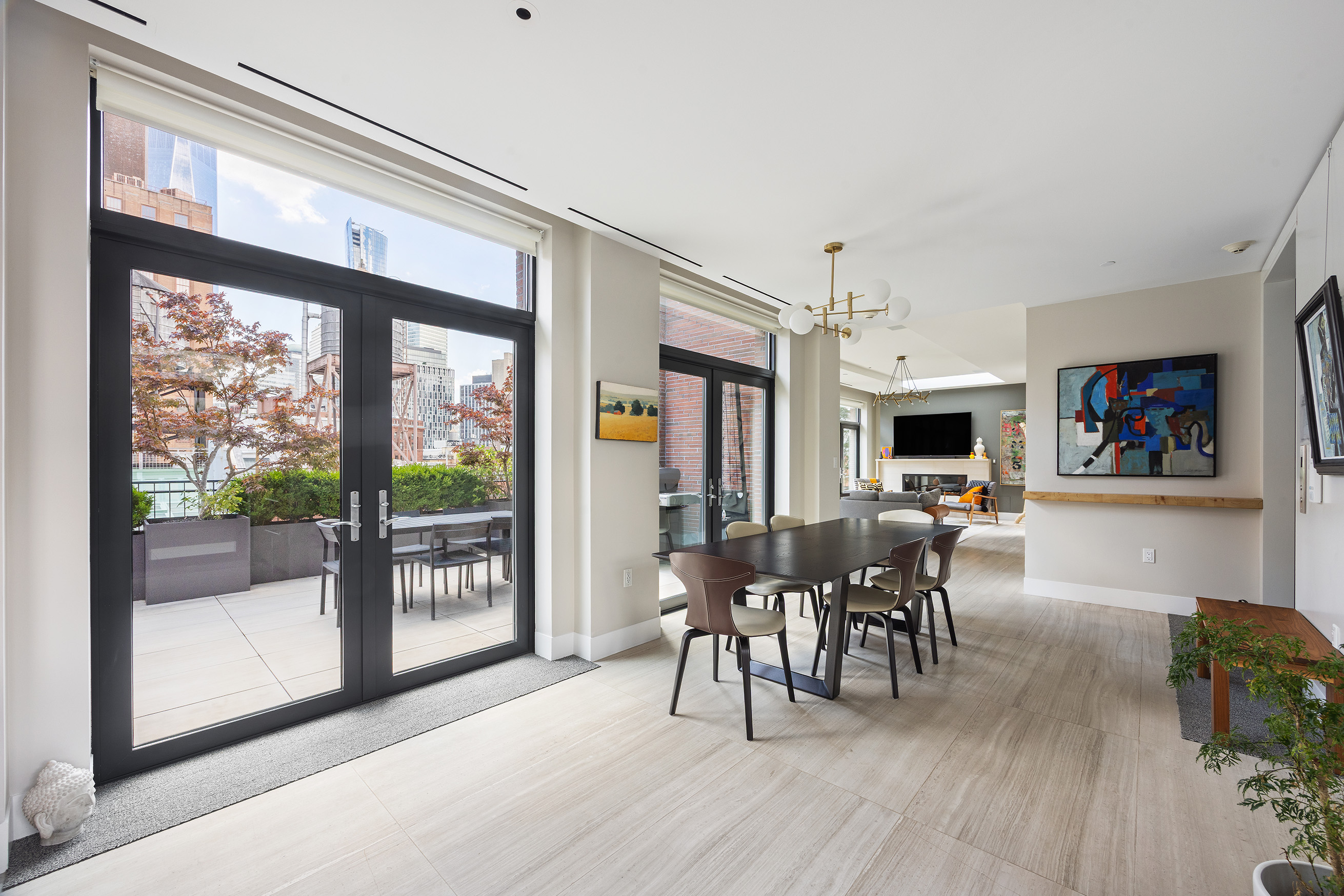 15 Leonard Street, Unit PH Manhattan, NY 10013 - Photo 6 of 37 a view of a dining room with furniture window and wooden floor