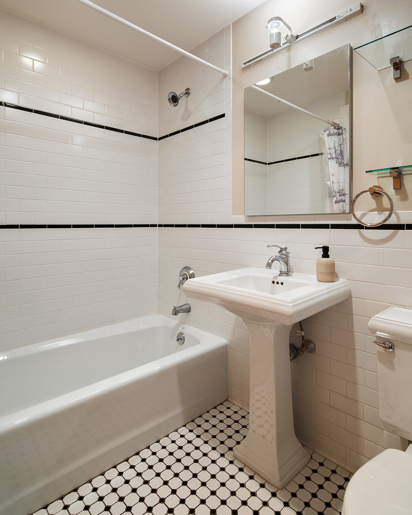 675 Sackett Street, Unit 210 Brooklyn, NY 11217 - Photo 6 of 8 a bathroom with a sink toilet and shower
