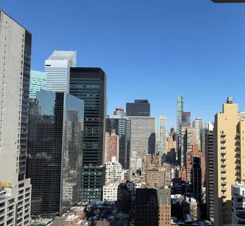 a view of city with tall buildings