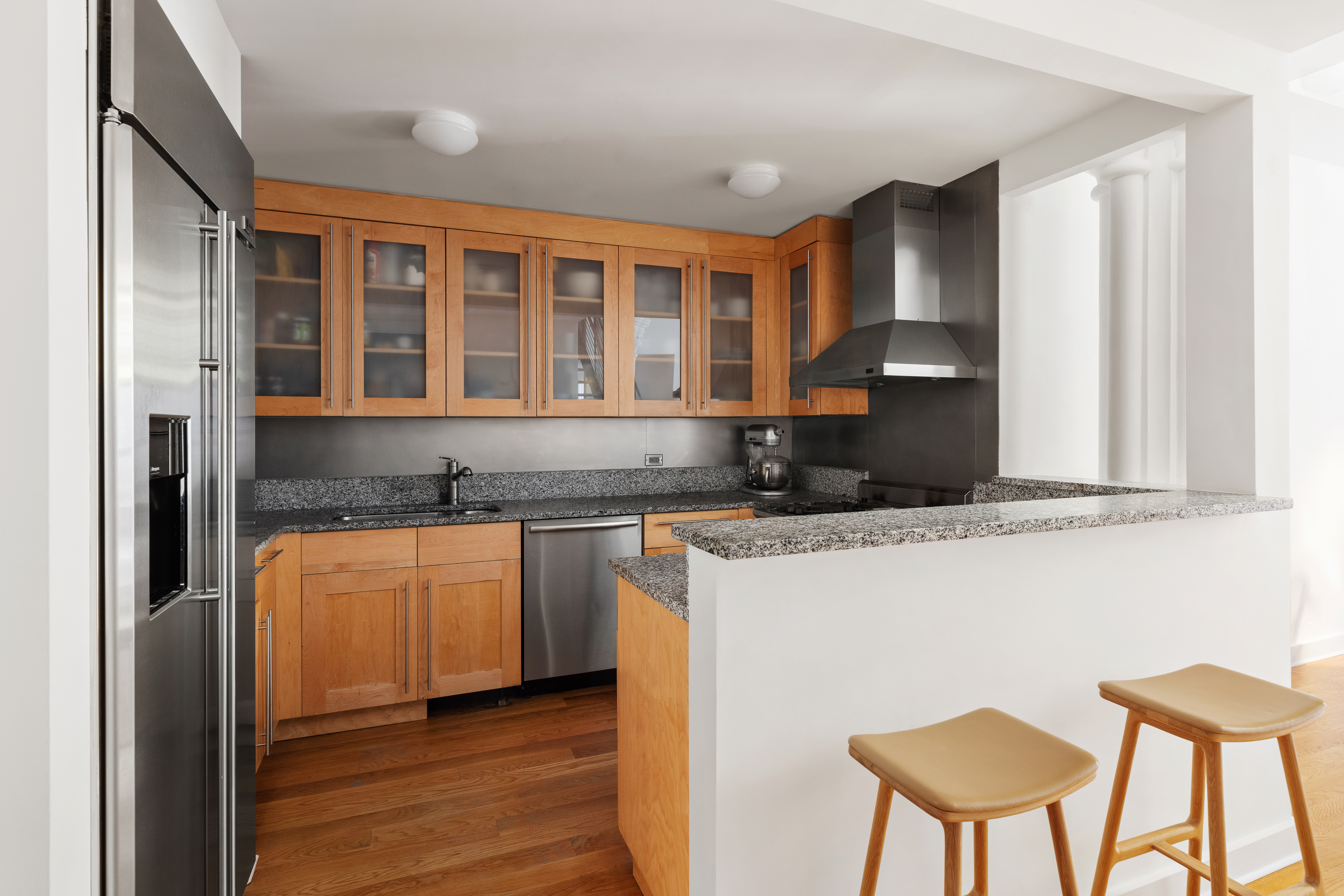 401 Hicks Street, Unit A3A Brooklyn, NY 11201 - Photo 13 of 22 a kitchen with stainless steel appliances granite countertop a stove top oven a sink and a refrigerator
