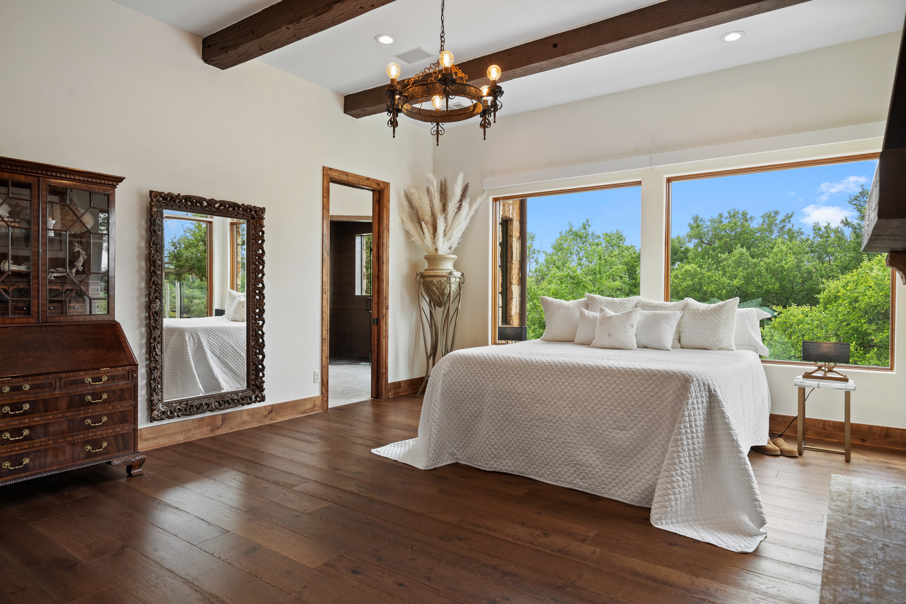808 Rivercliff Drive Spicewood, TX 78669 - Photo 53 of 71 a living room with furniture and a chandelier
