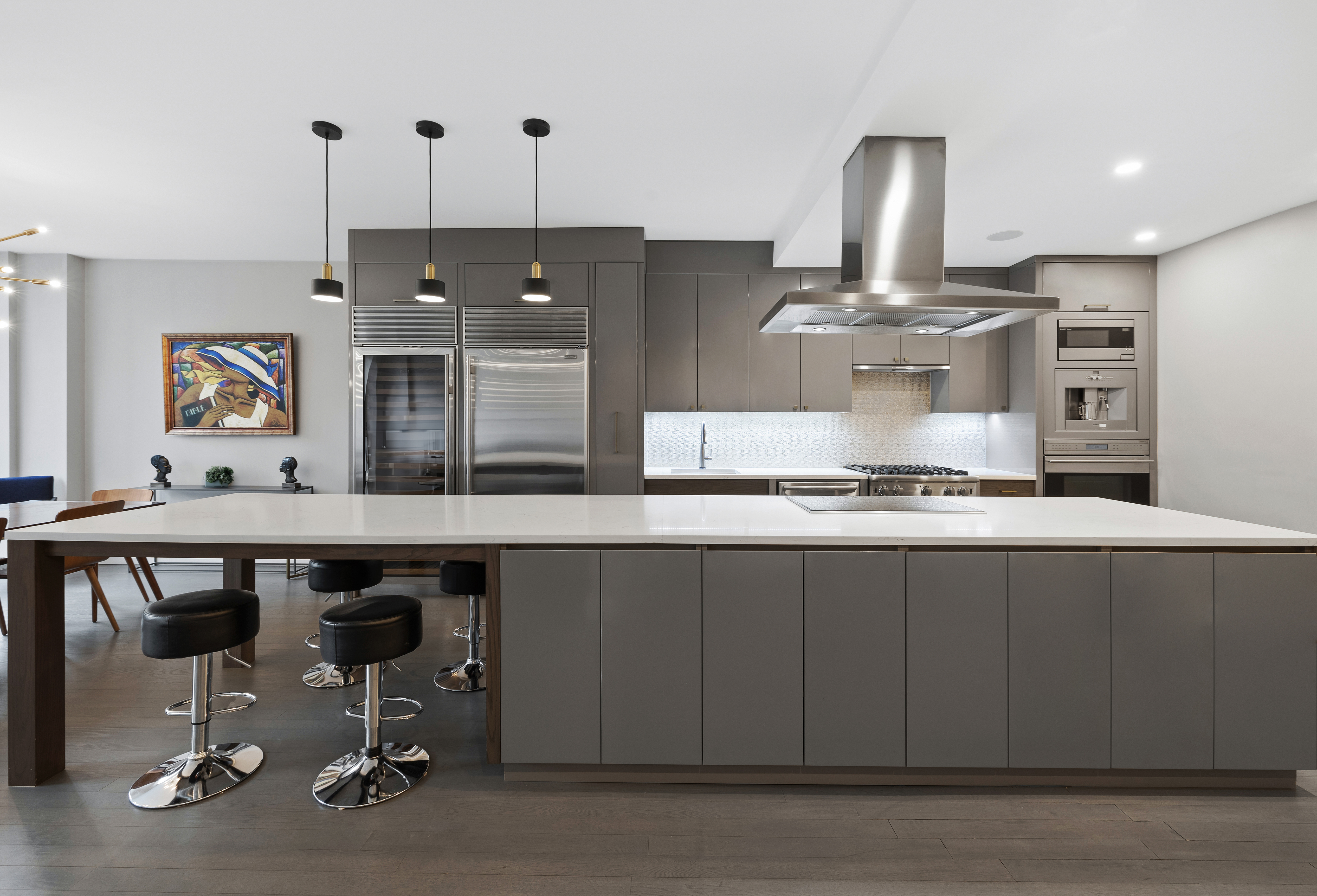 129 West 123rd Street, Unit 3 Manhattan, NY 10027 - Photo 2 of 20 a open kitchen with a stove a table and chairs