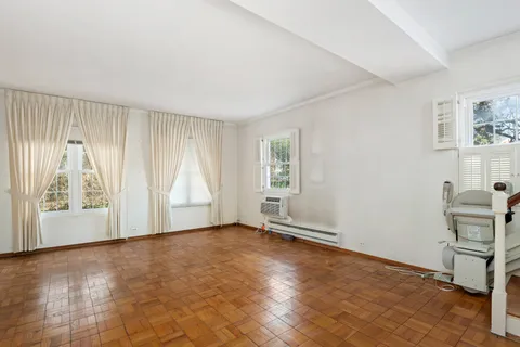 an empty room with windows