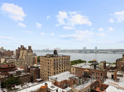 a view of a city and lake