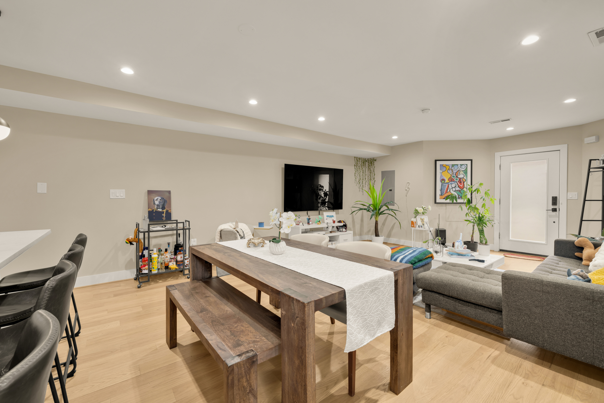 14 T Street Northeast, Unit 1 Washington, DC 20002 - Photo 14 of 39 a living room with furniture and a flat screen tv
