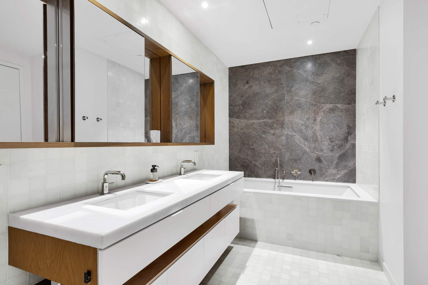 30 Warren Street, Unit 2C Manhattan, NY 10007 - Photo 7 of 18 a bathroom with a bathtub and a sink