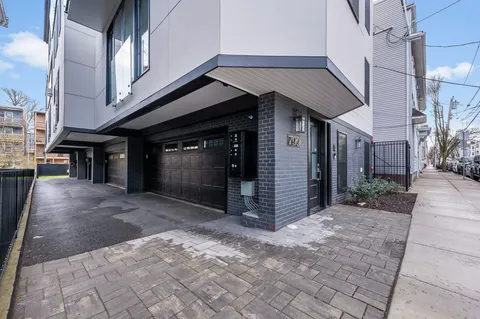 a view of a house with a street