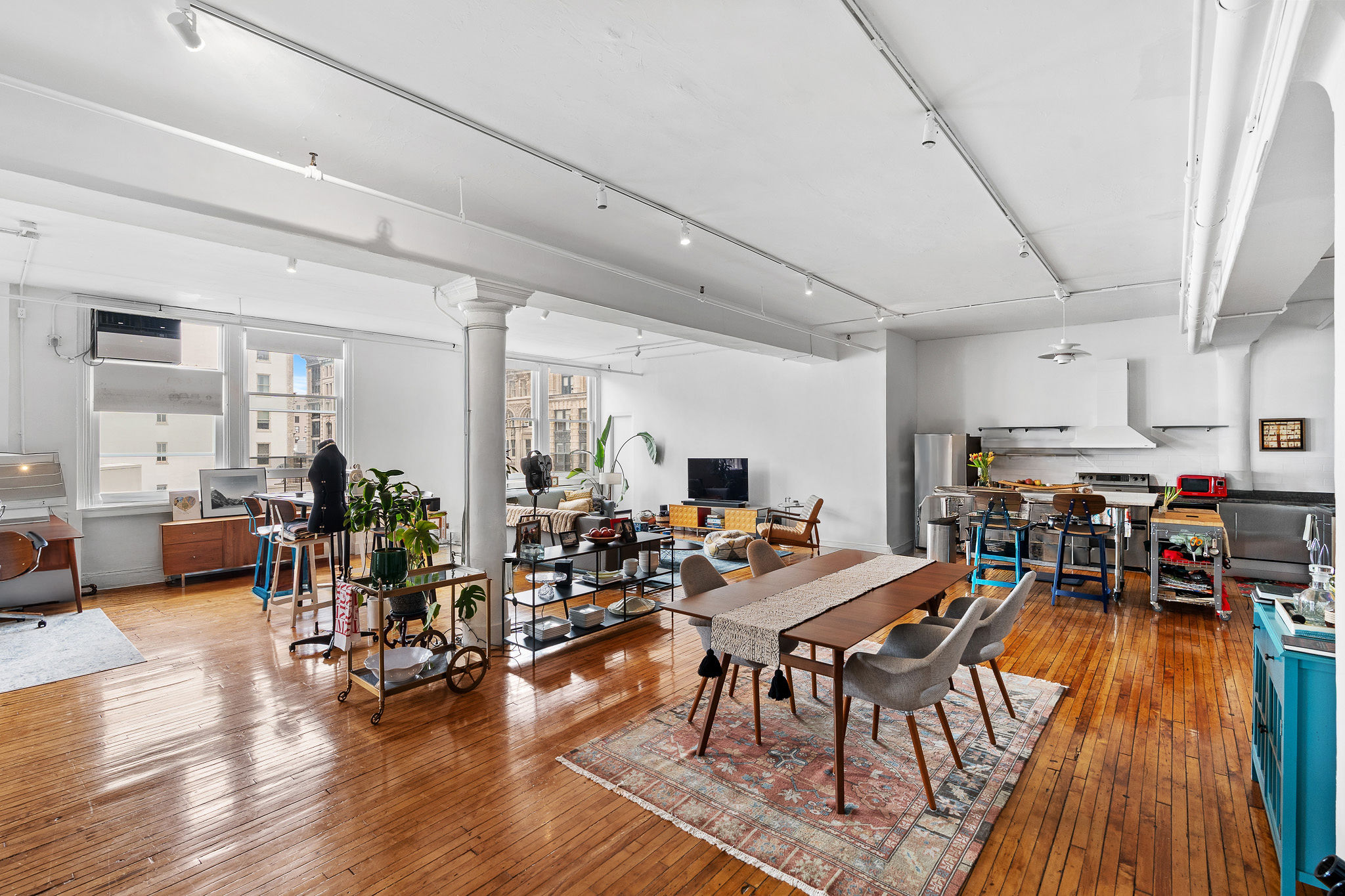 565 Broadway, Unit 8W Manhattan, NY 10012 - Photo 20 of 23 a lots of furniture and hardwood floor