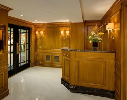 a view of a hallway with entryway door
