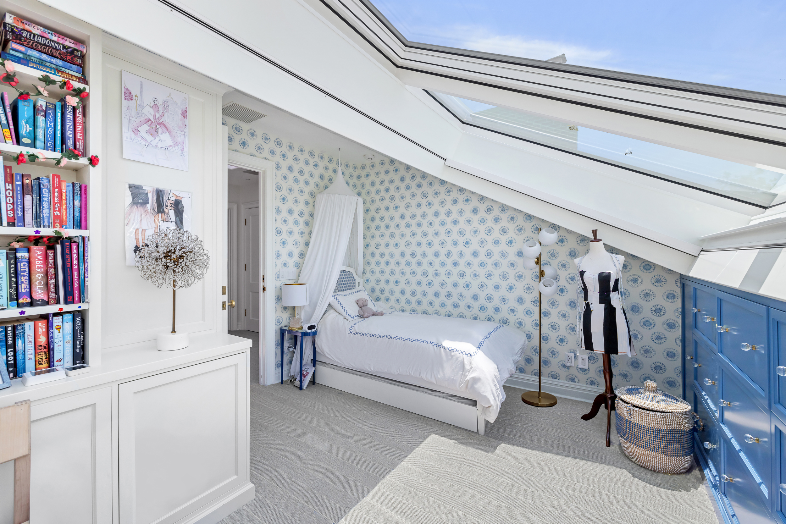 13 Garden Place, Unit B Brooklyn, NY 11201 - Photo 13 of 22 a bedroom with a bed and a book shelf