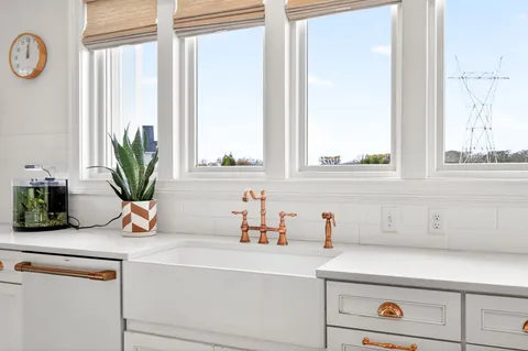 a bathroom with a sink toilet and vanity