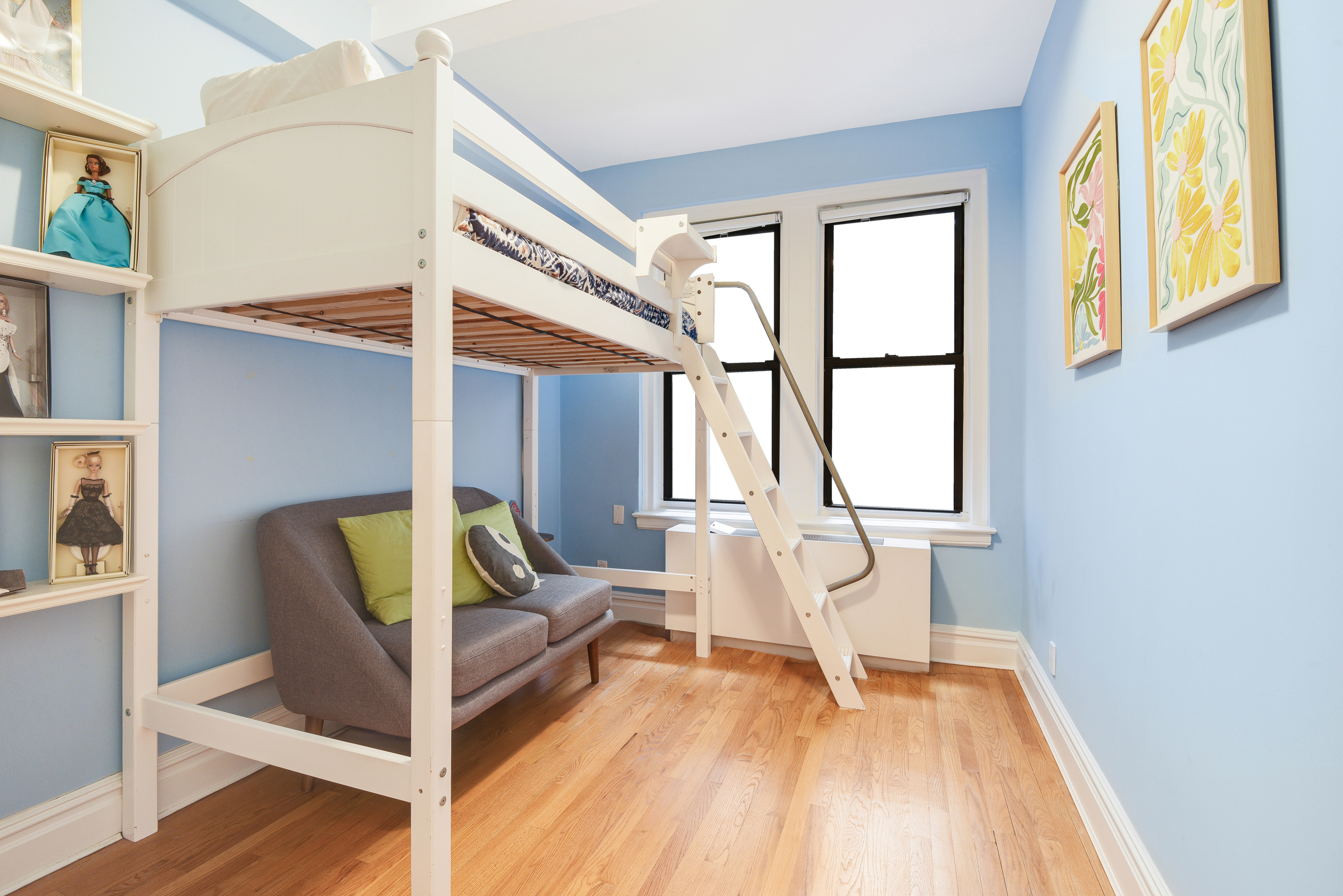 321 West 90th Street, Unit 2F Manhattan, NY 10024 - Photo 10 of 16 a living room with furniture and a wooden floor