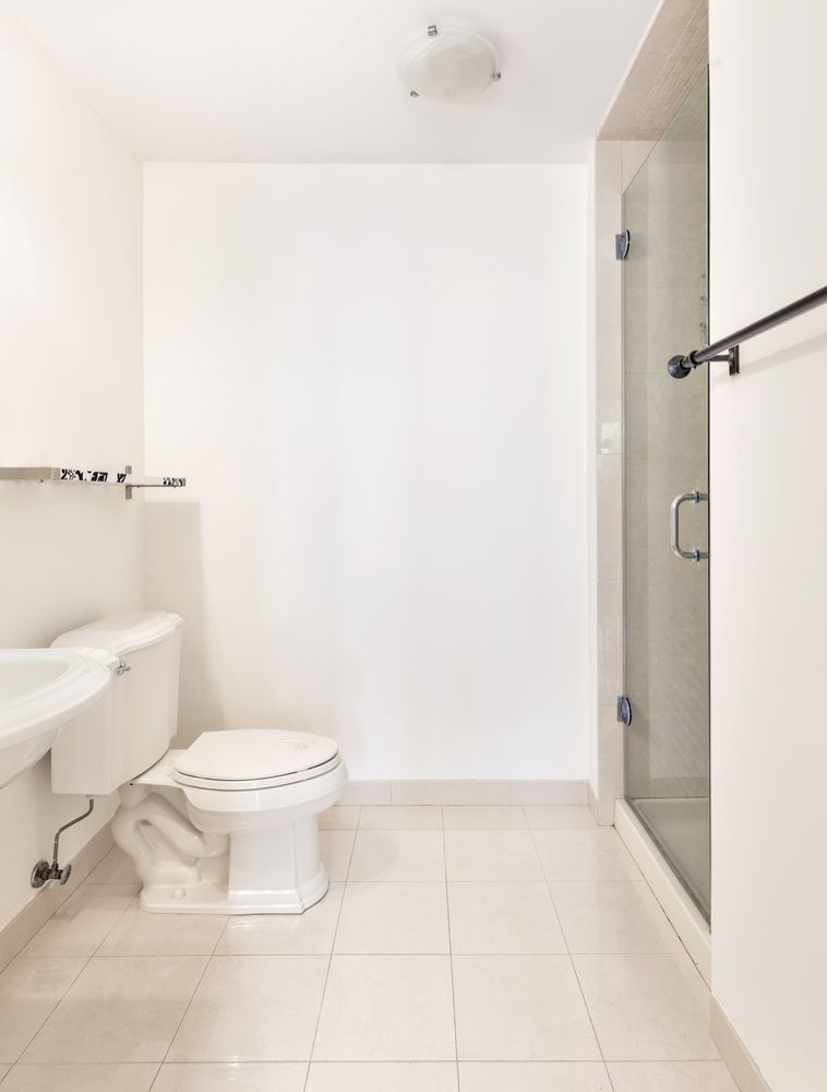 52 Dean Street, Unit 4A Brooklyn, NY 11201 - Photo 4 of 7 a bathroom with a toilet and a shower