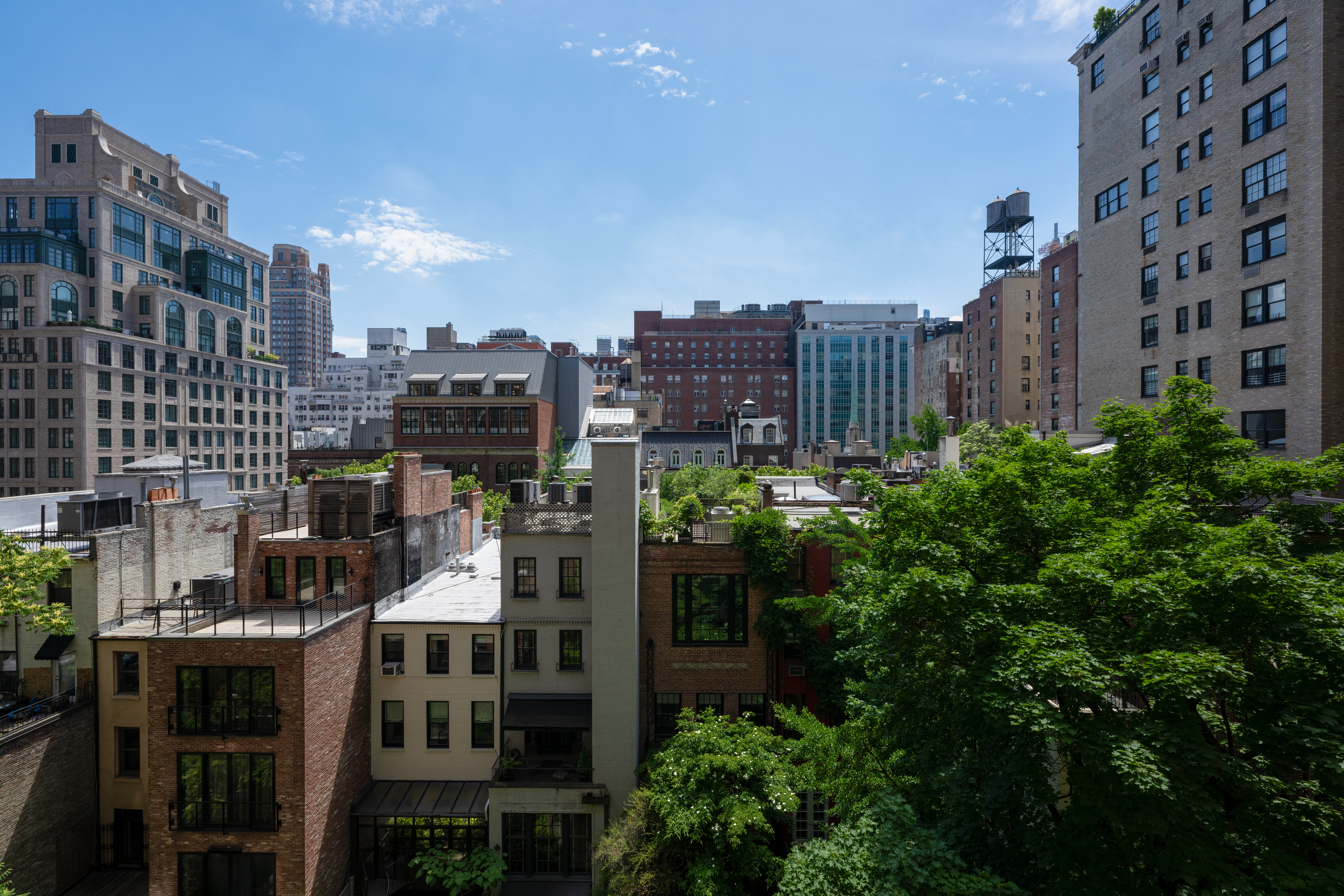 124 East 79th Street, Unit 7D Manhattan, NY 10075 - Photo 19 of 25 a view of a city with tall buildings