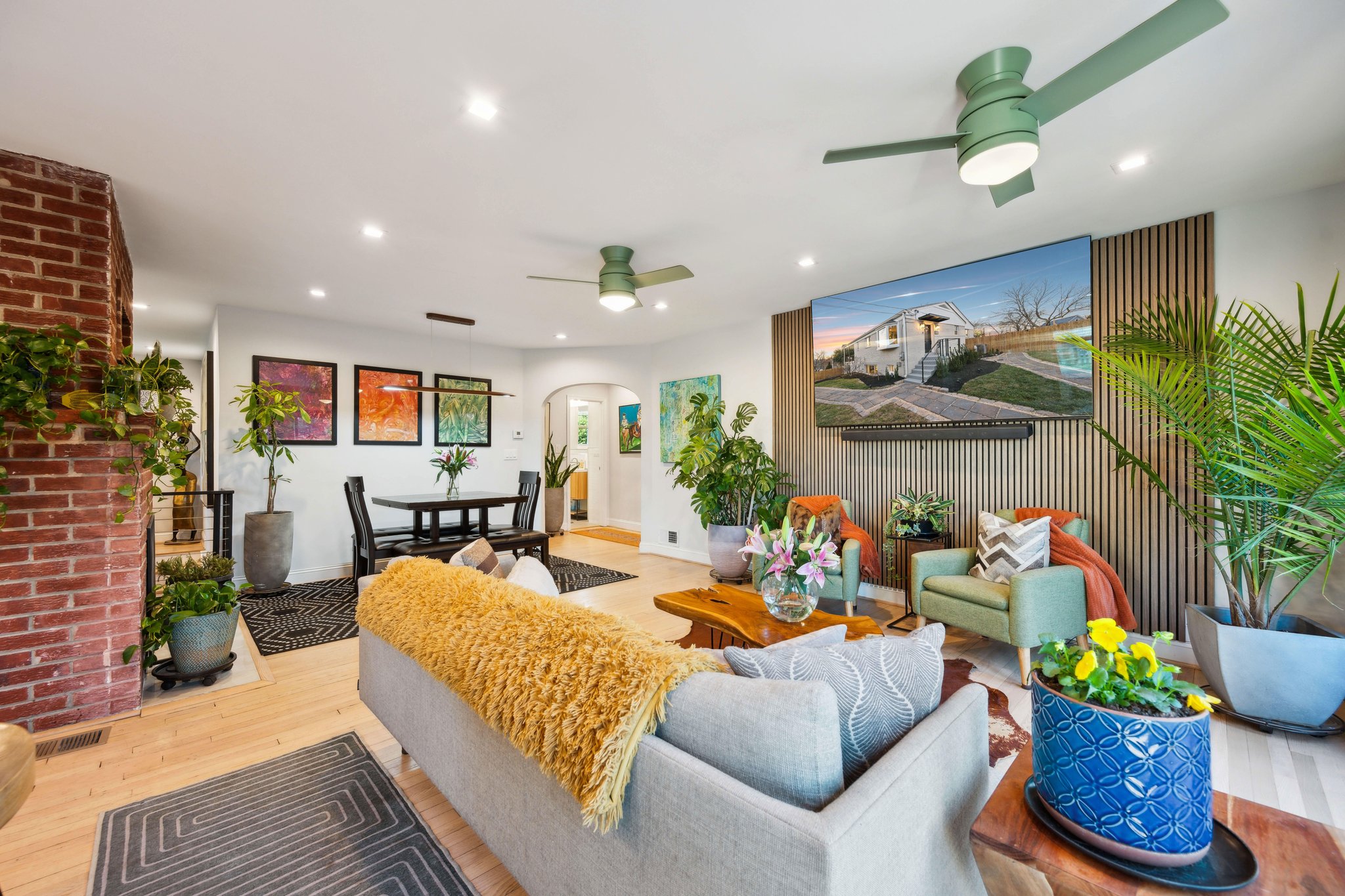 2607 Ross Road Chevy Chase, MD 20815 - Photo 5 of 37 a living room with furniture kitchen and a potted plant