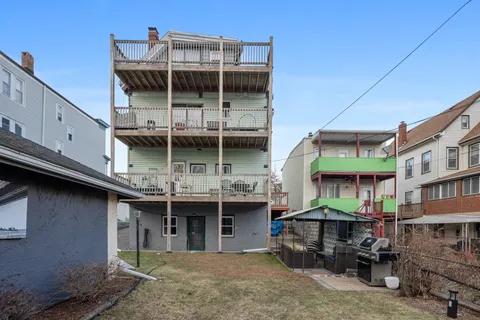 a view of a building with sitting area