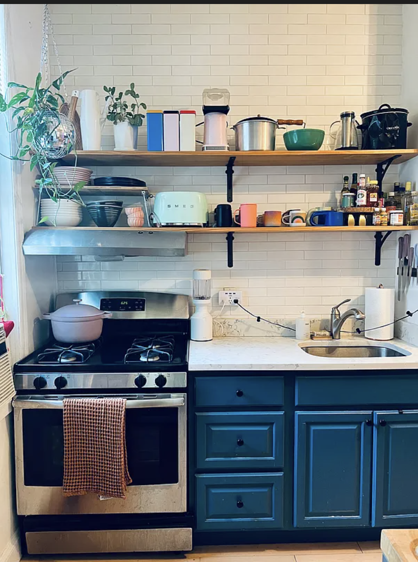 283 Devoe Street, Unit 3R Brooklyn, NY 11211 - Photo 1 of 10 a kitchen with stainless steel appliances a stove and cabinets