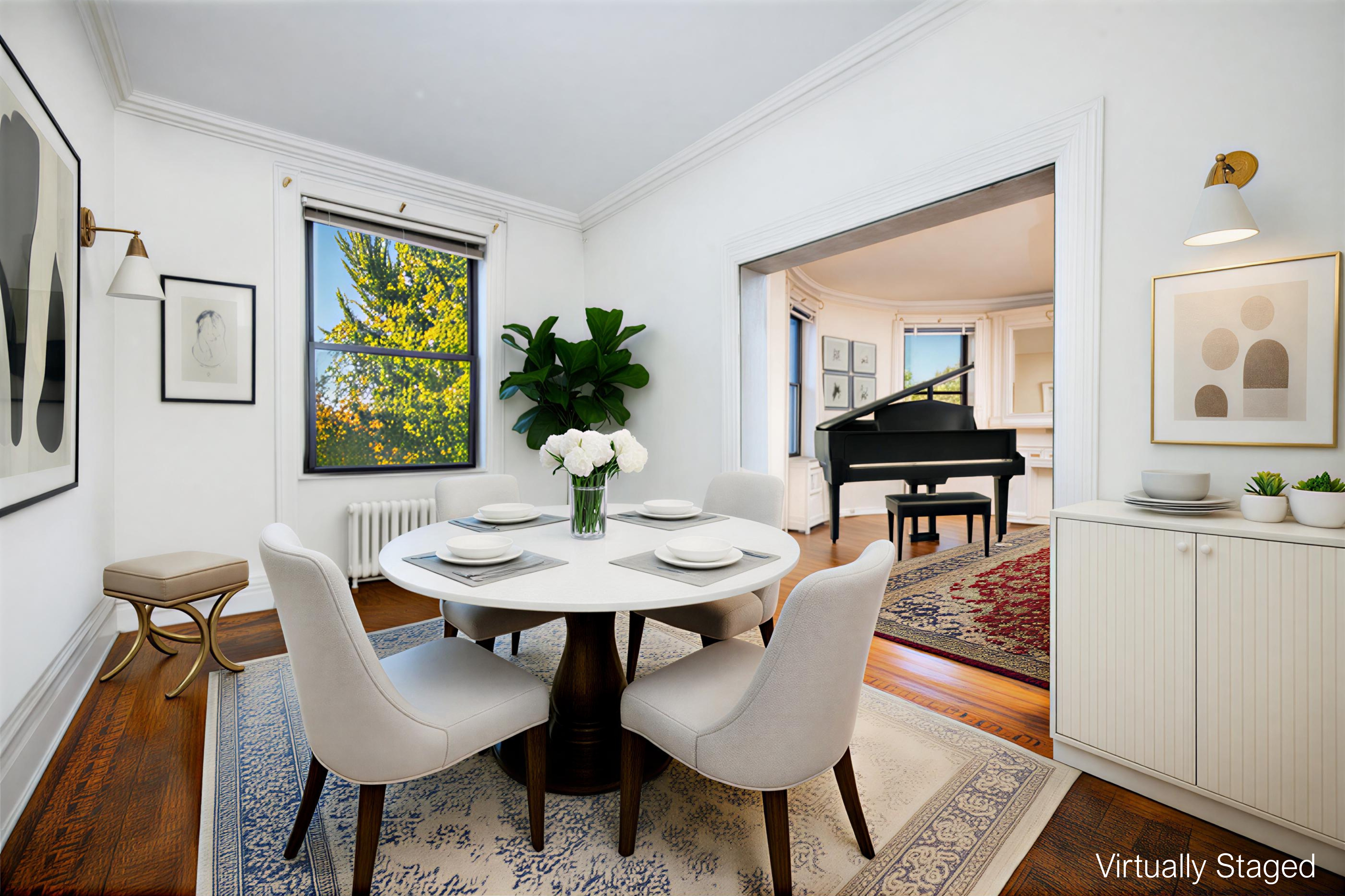 194 Riverside Drive, Unit 5E Manhattan, NY 10025 - Photo 4 of 26 a view of a dining room with furniture and a potted plant