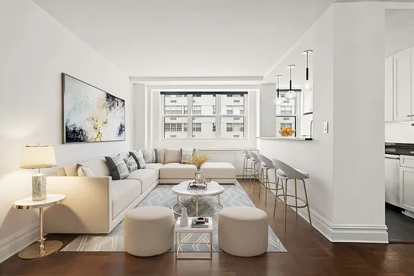 a living room with furniture and a window
