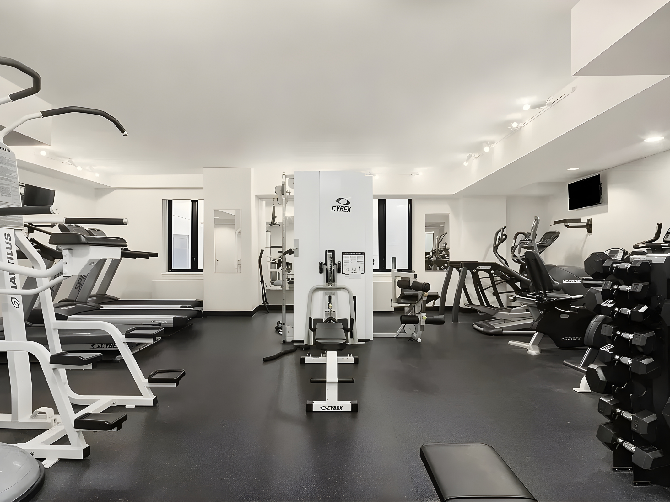 380 Lenox Avenue, Unit 3J Manhattan, NY 10027 - Photo 8 of 9 a view of a room with gym equipment
